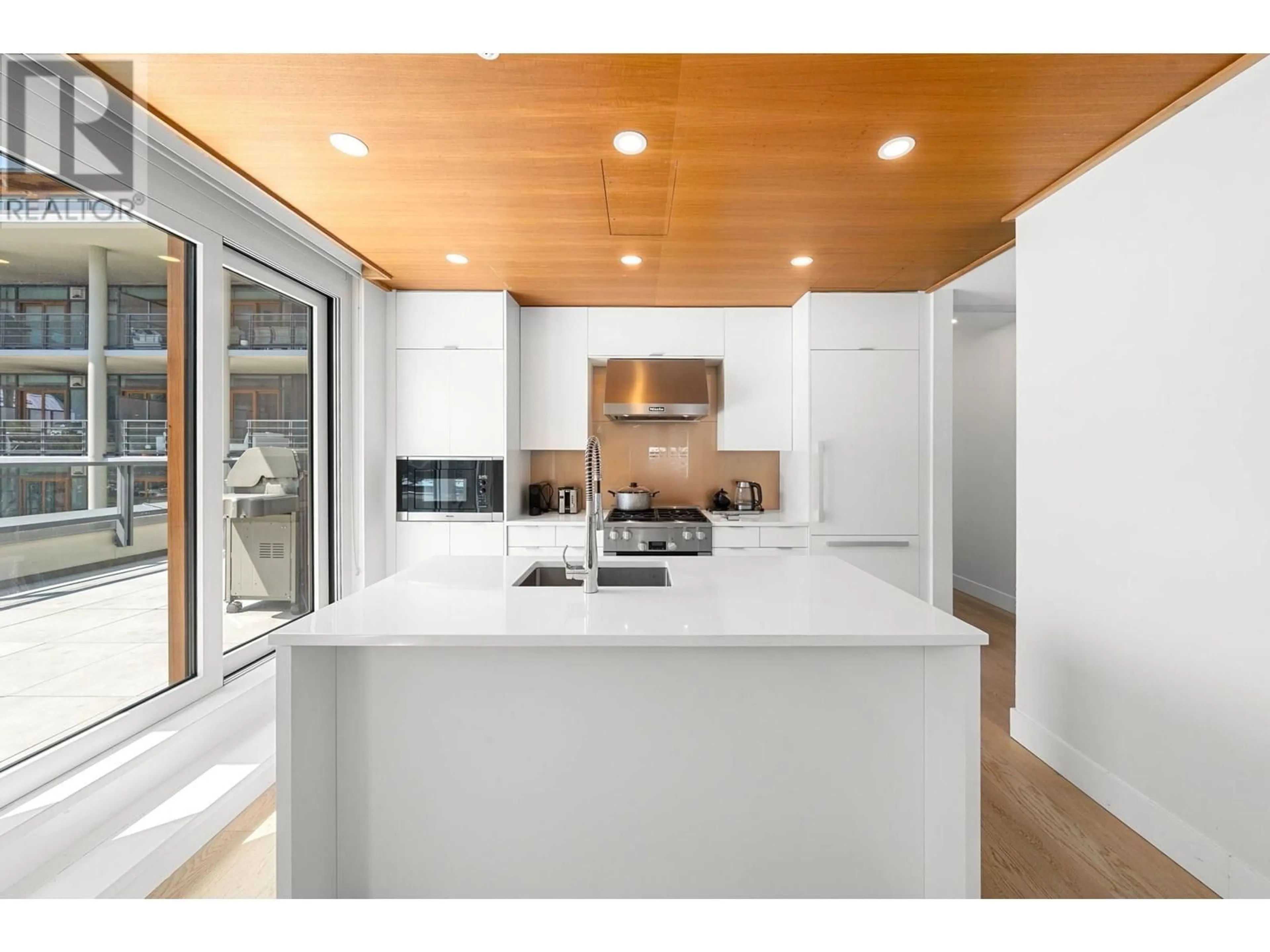 Open concept kitchen, unknown for 309 - 6707 NELSON AVENUE, West Vancouver British Columbia V7W0A4