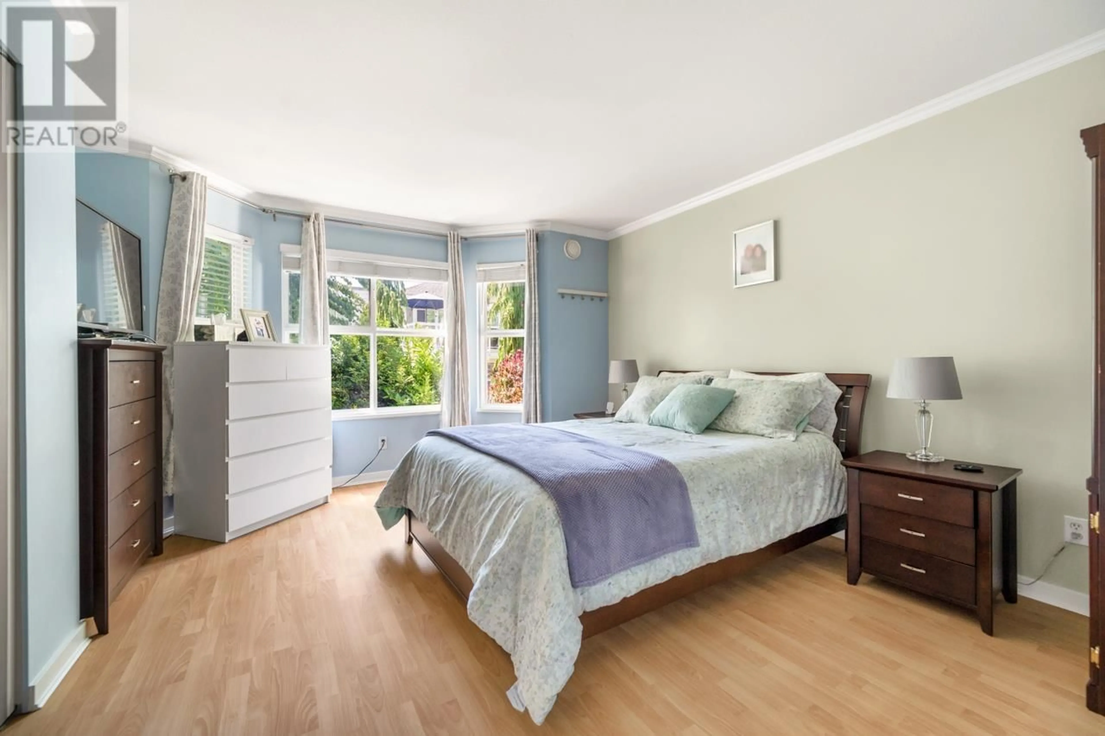 Bedroom with bed, wood/laminate floor for 8577 AQUITANIA PLACE, Vancouver British Columbia V5S4V7