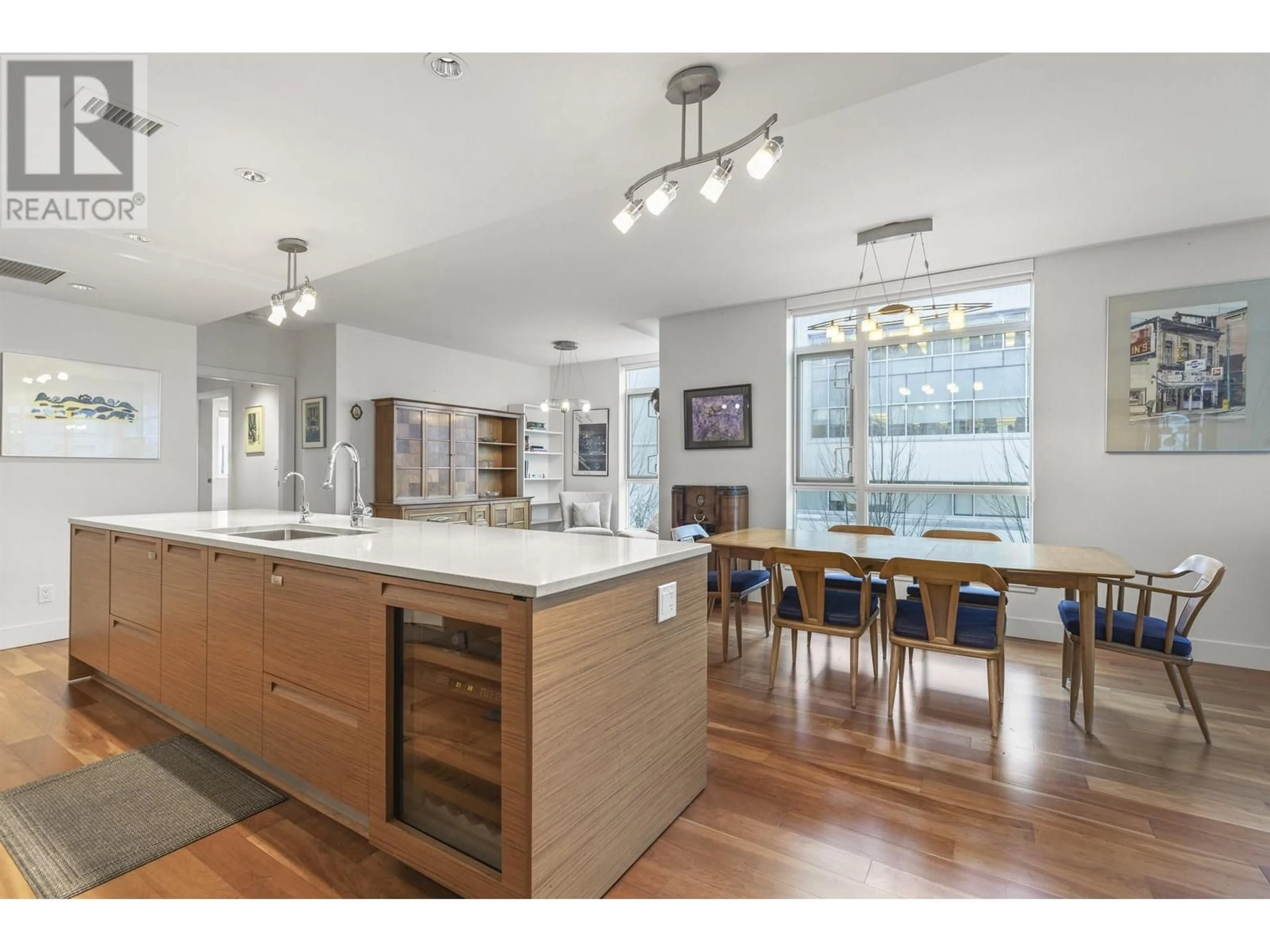 Open concept kitchen, wood/laminate floor for 302 - 6080 IONA DRIVE, Vancouver British Columbia V6T0A4