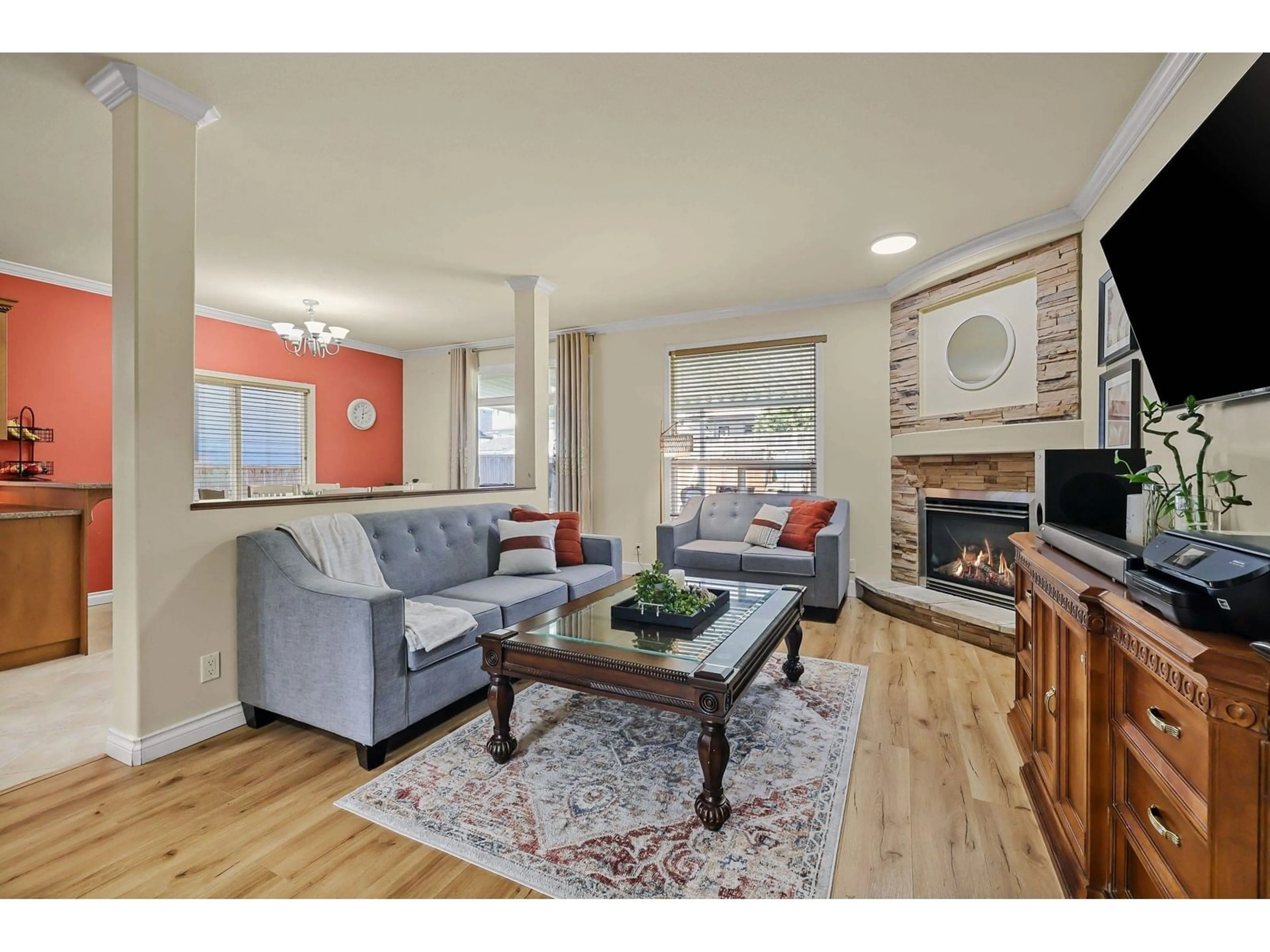 Living room with furniture, wood/laminate floor for 18629 56B, Surrey British Columbia V3S7N2