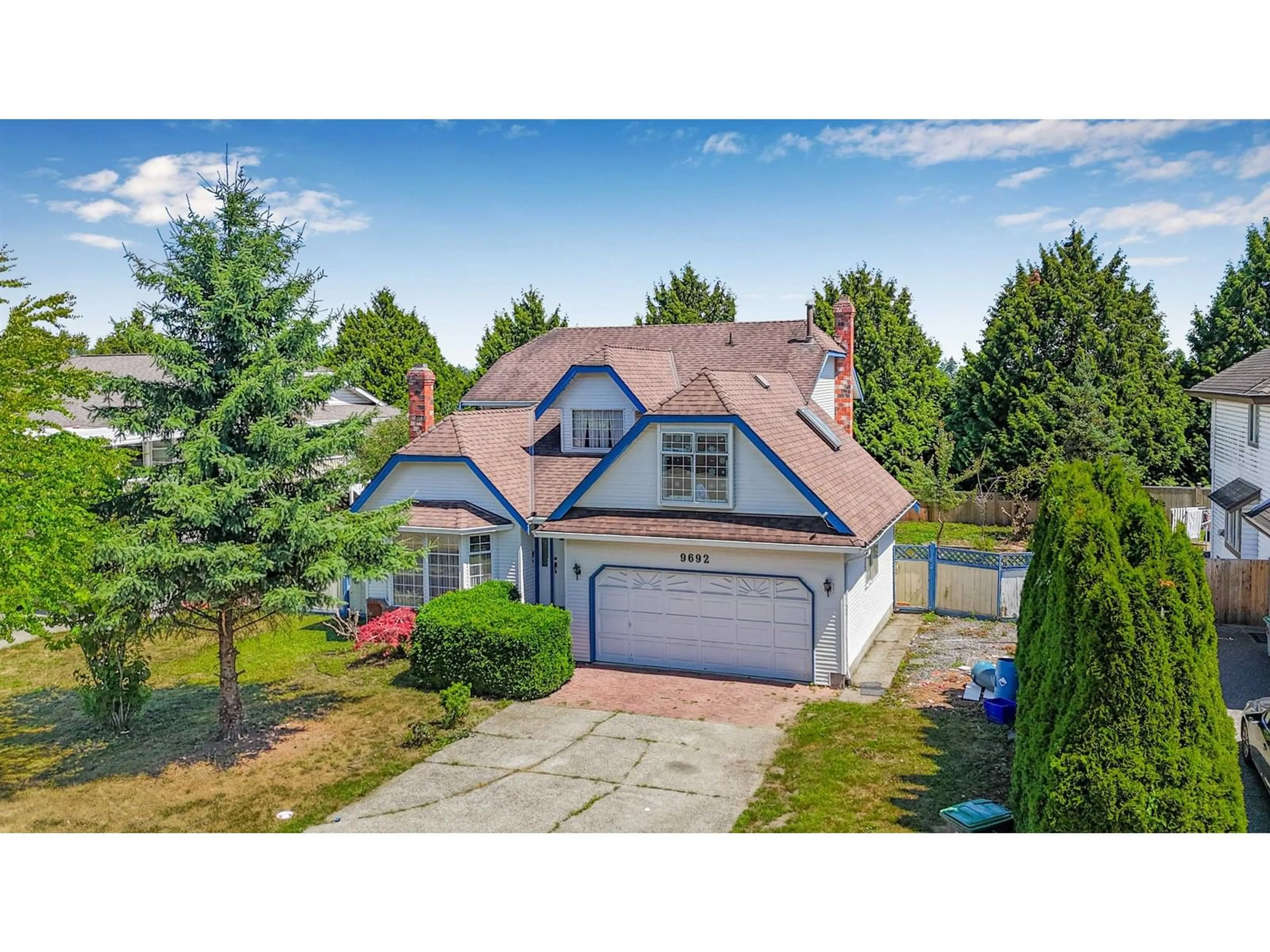 A pic from outside/outdoor area/front of a property/back of a property/a pic from drone, street for 9692 157B, Surrey British Columbia V4N2T3
