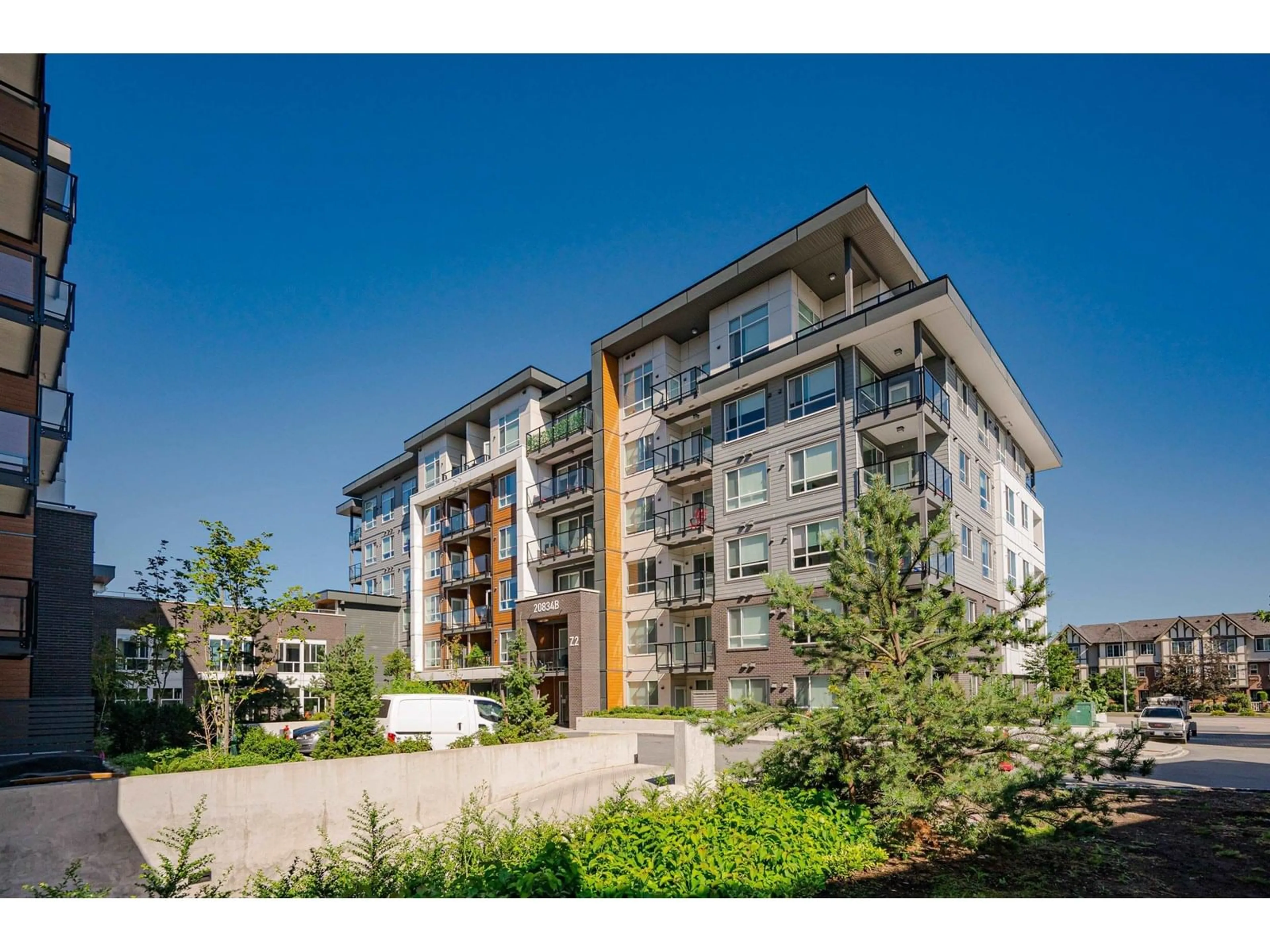 A pic from outside/outdoor area/front of a property/back of a property/a pic from drone, building for B307 - 20834 80, Langley British Columbia V2Y3M5