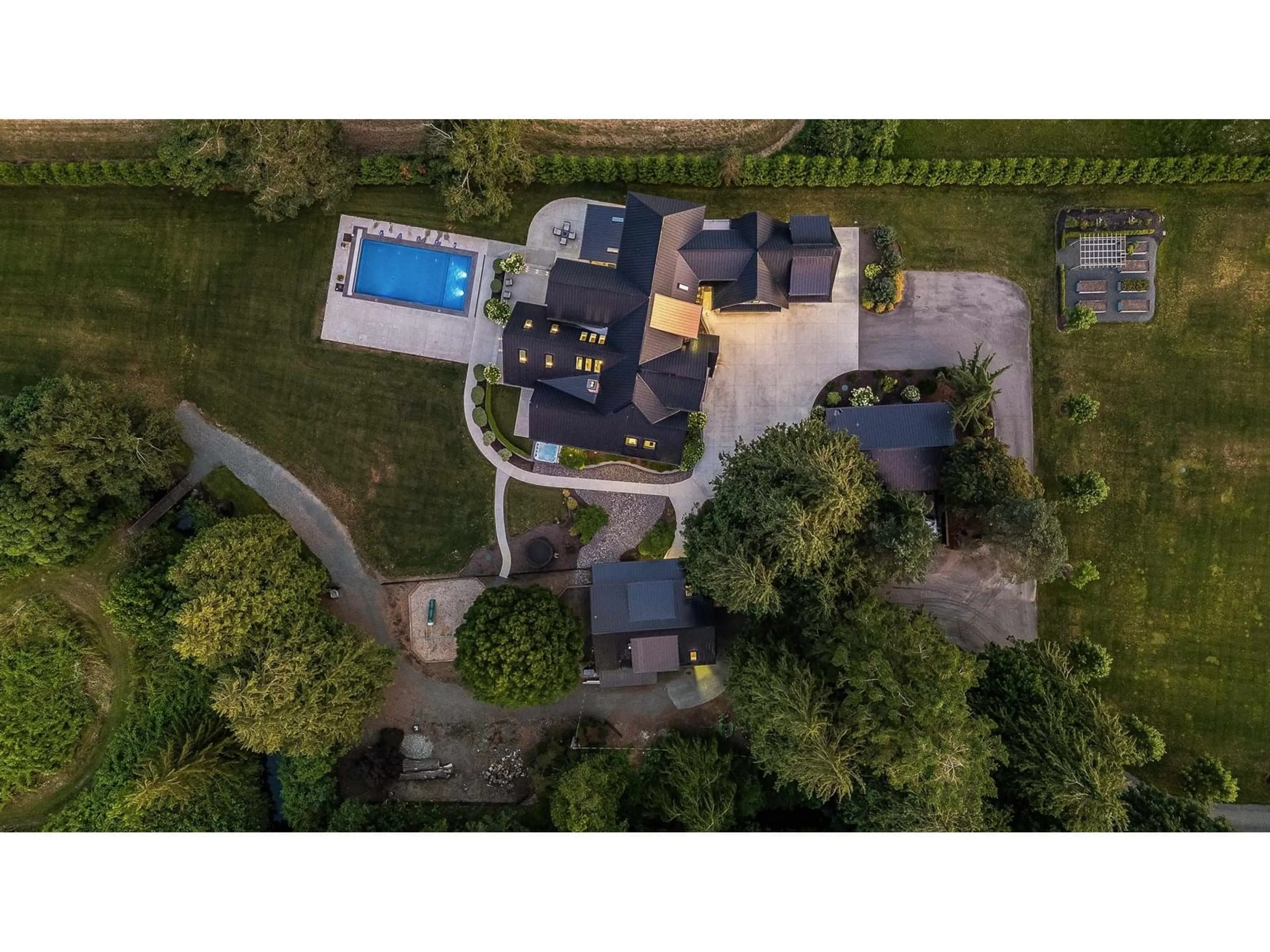 A pic from outside/outdoor area/front of a property/back of a property/a pic from drone, street for 5474 LICKMAN ROAD, Sardis - Greendale British Columbia V2R4P8