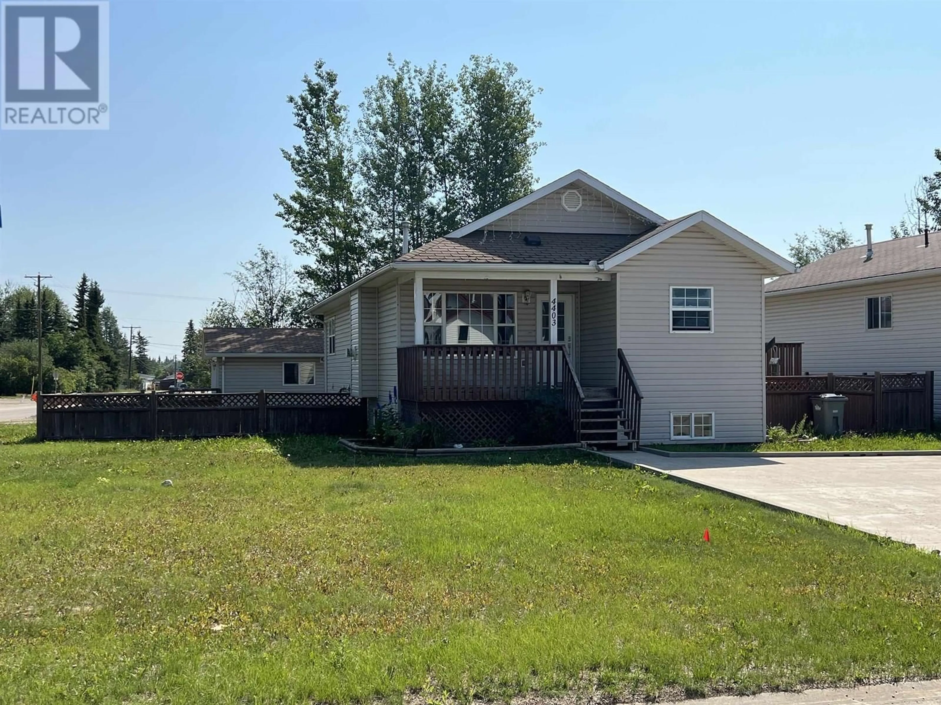 Home with vinyl exterior material, street for 4403 HERITAGE CRESCENT, Fort Nelson British Columbia V0C1R0