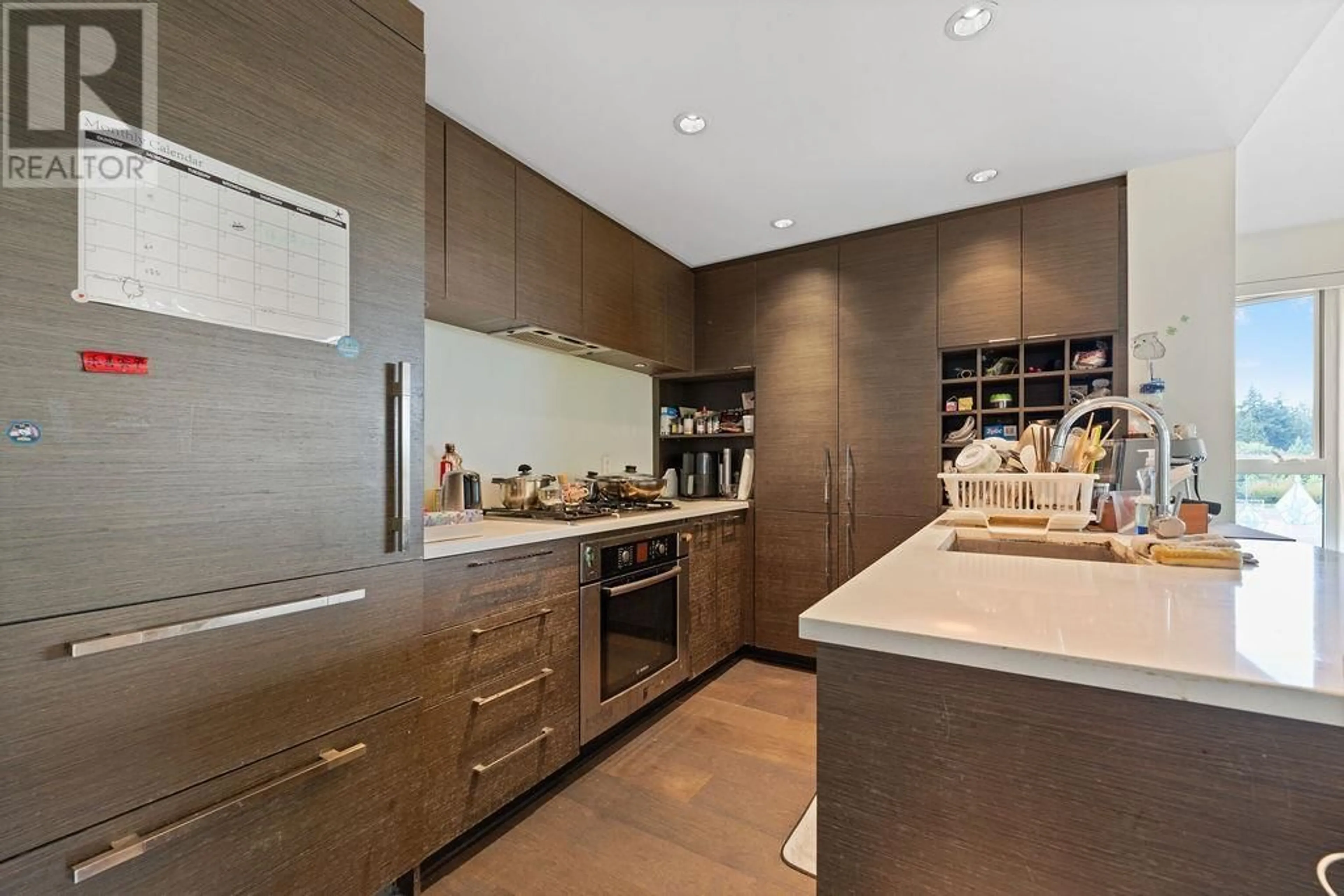 Contemporary kitchen, ceramic/tile floor for 610 - 5955 BIRNEY AVENUE, Vancouver British Columbia V6S0C5