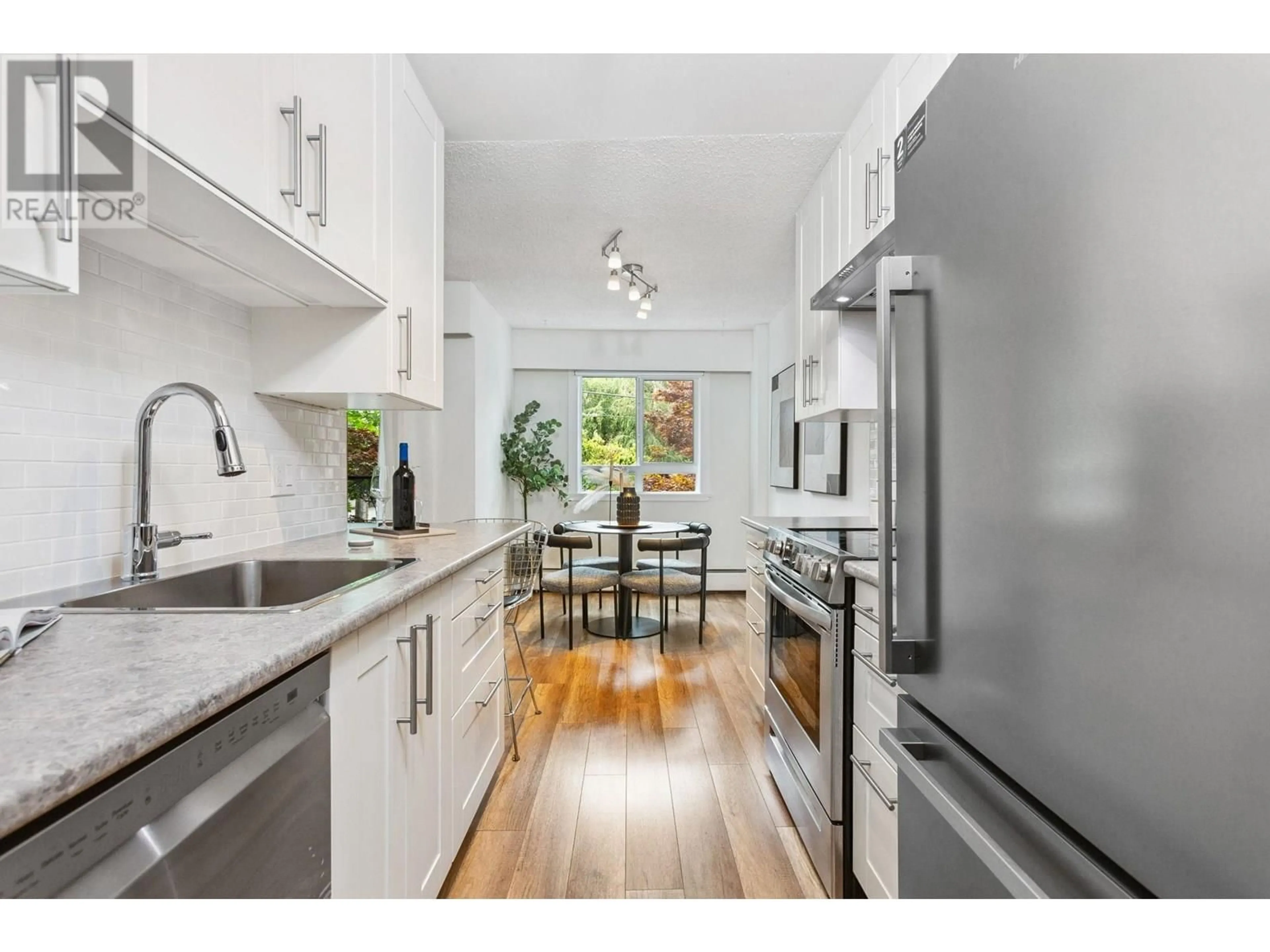 Open concept kitchen, unknown for 208 - 2424 CYPRESS ST STREET, Vancouver British Columbia V6J1T6