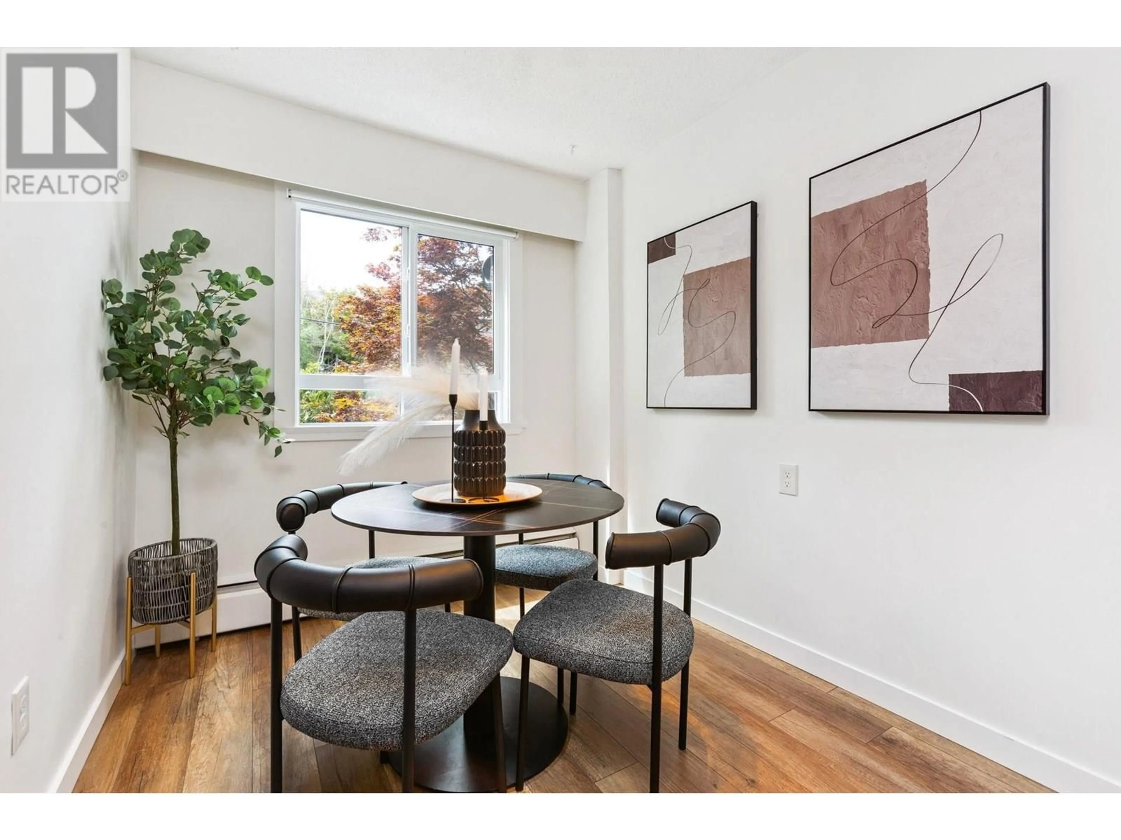 Dining room, wood/laminate floor for 208 - 2424 CYPRESS ST STREET, Vancouver British Columbia V6J1T6