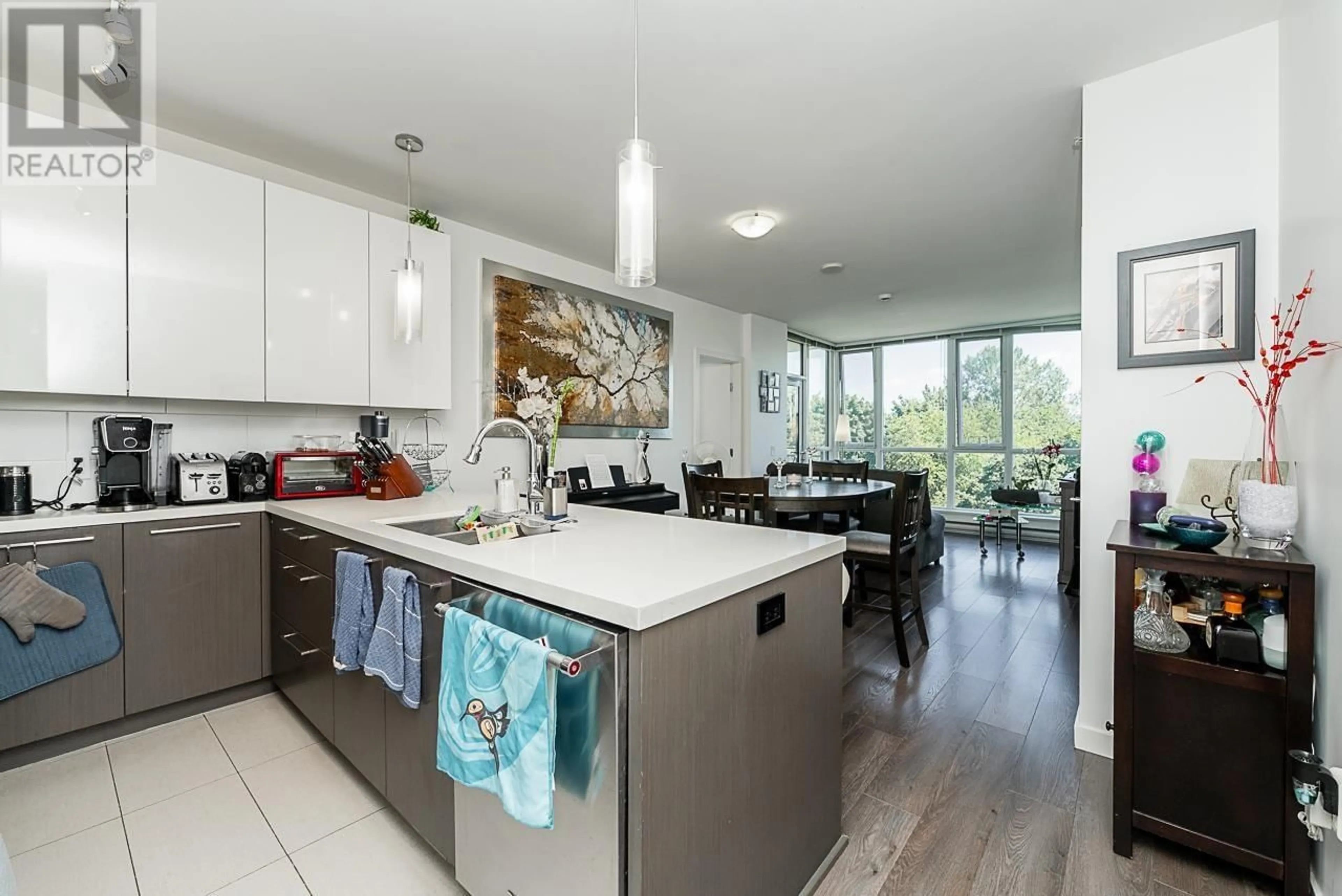 Open concept kitchen, ceramic/tile floor for 711 - 271 FRANCIS WAY, New Westminster British Columbia V3L0H2