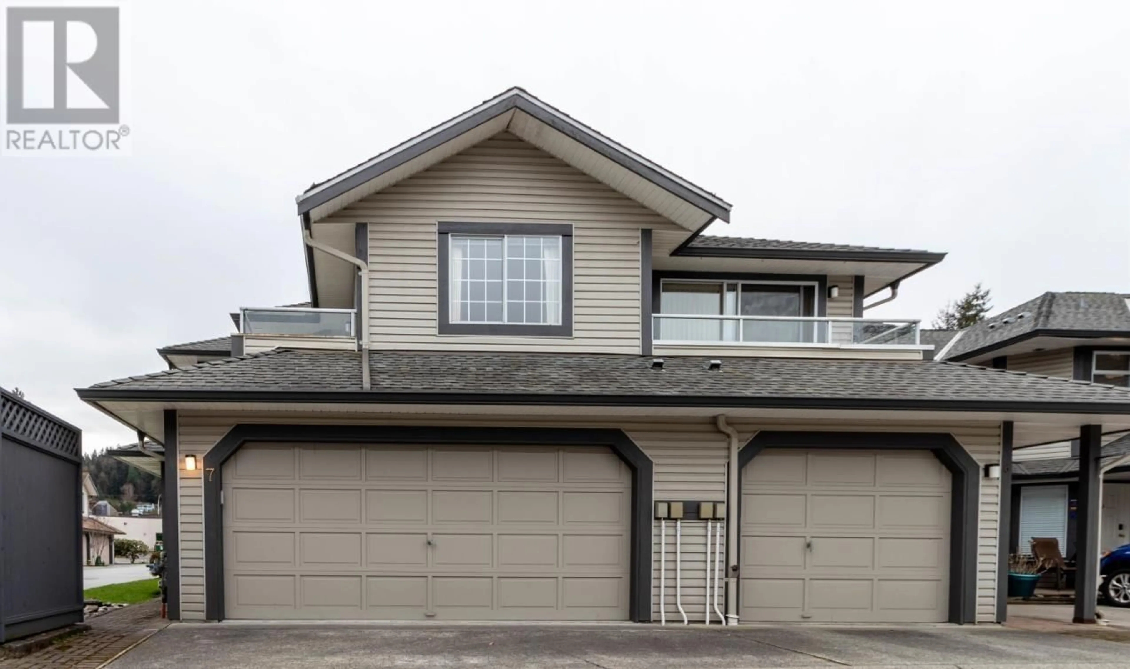 Home with vinyl exterior material, street for 7 - 2561 RUNNEL DRIVE, Coquitlam British Columbia V3E2S3