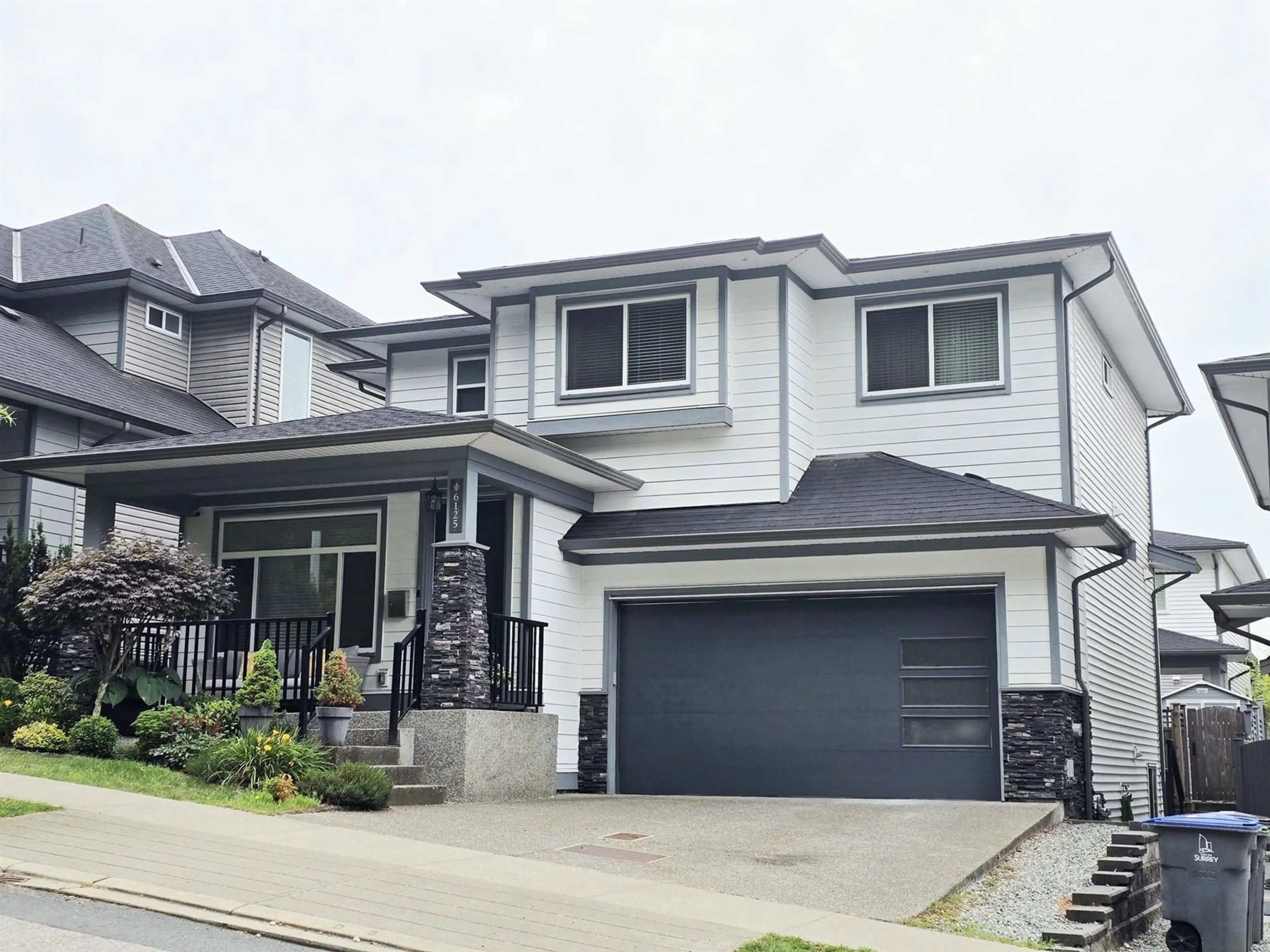 Home with vinyl exterior material, street for 6125 146, Surrey British Columbia V3S3A1