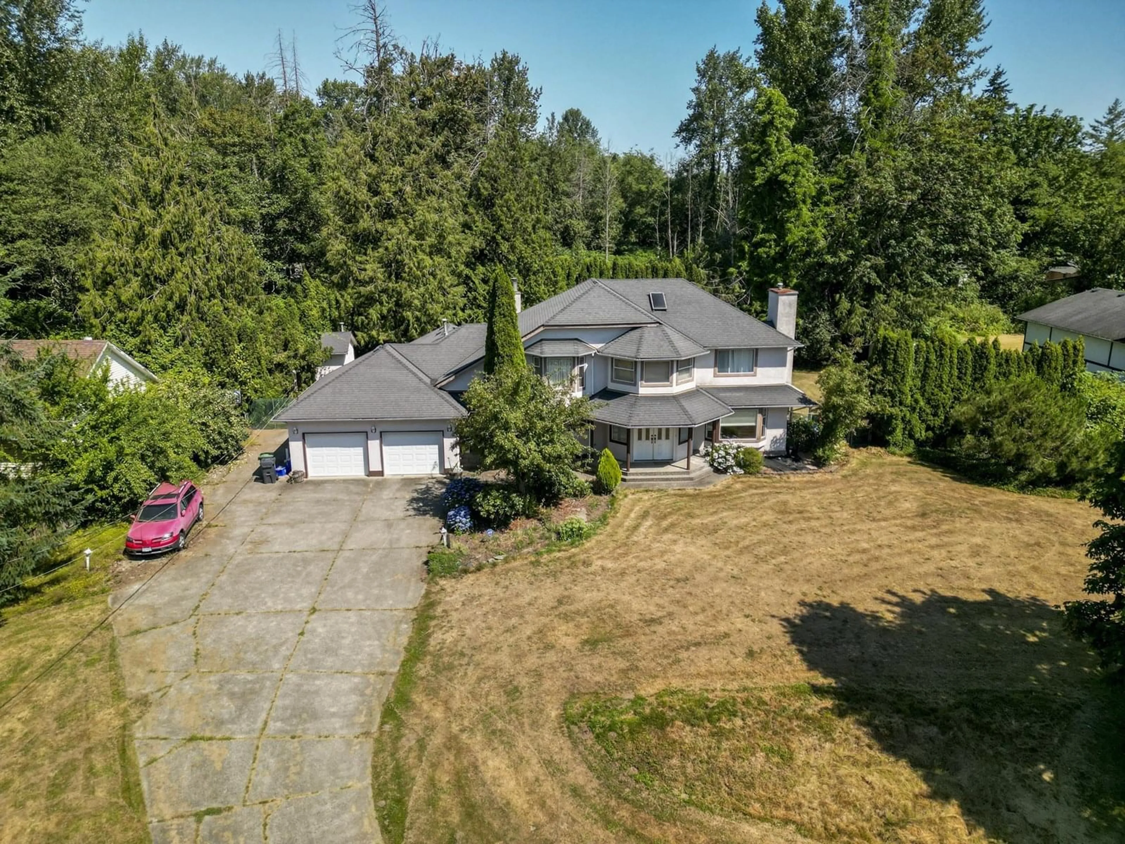 A pic from outside/outdoor area/front of a property/back of a property/a pic from drone, street for 20745 68TH, Langley British Columbia V2Y1R1