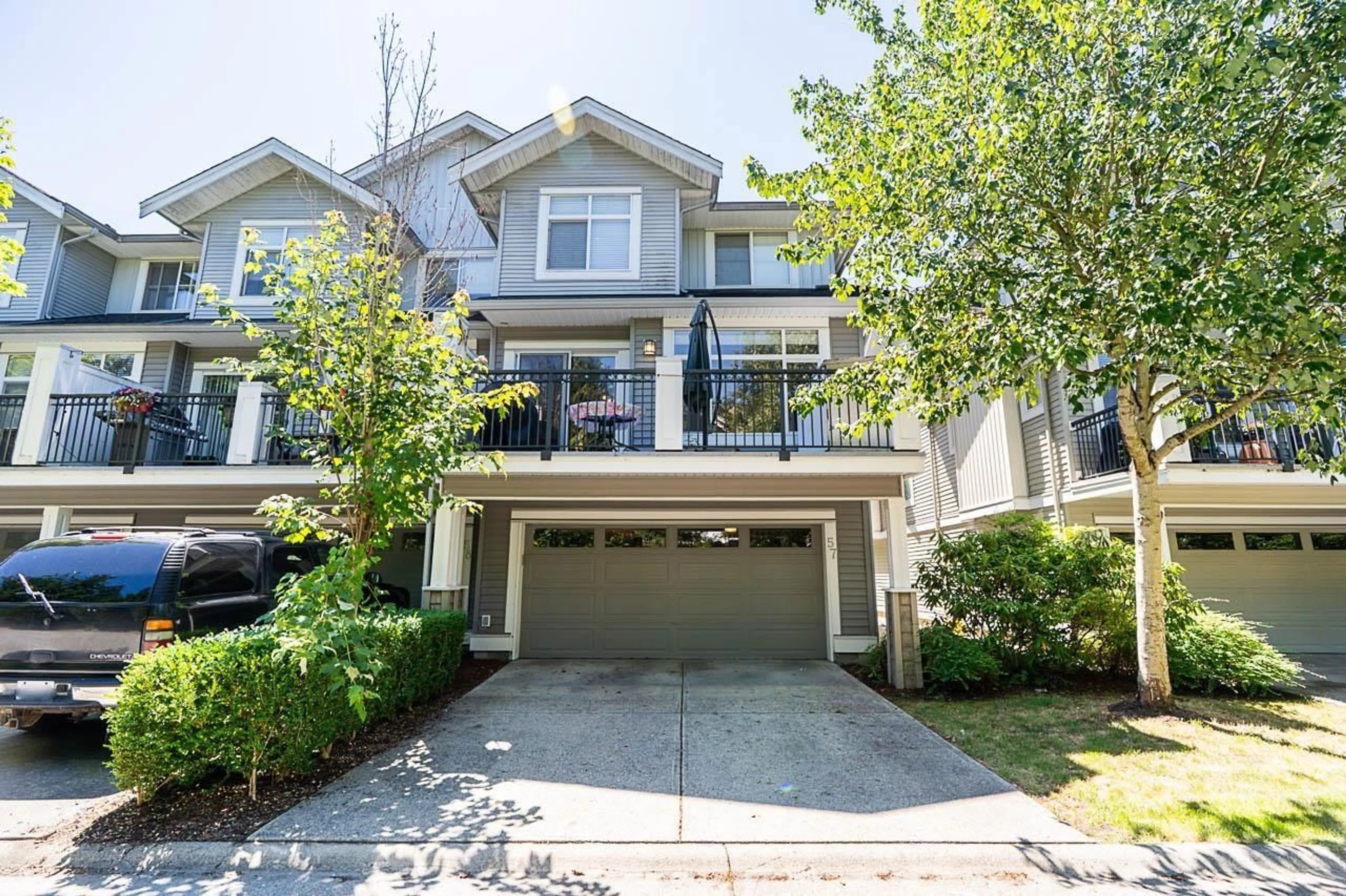 A pic from outside/outdoor area/front of a property/back of a property/a pic from drone, street for 57 - 19330 69, Surrey British Columbia V4N0Z2