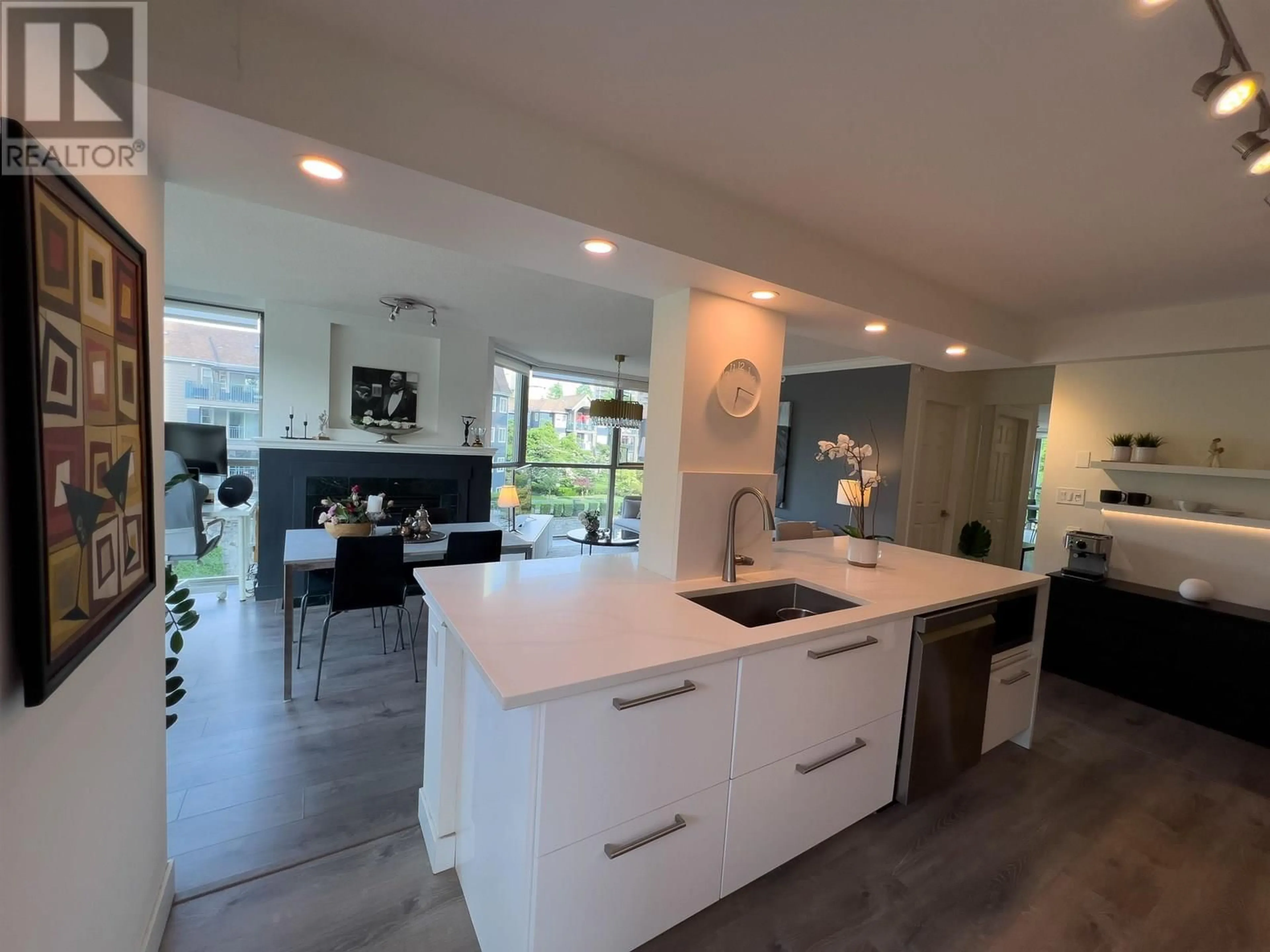 Open concept kitchen, ceramic/tile floor for 305 - 3070 GUILDFORD WAY, Coquitlam British Columbia V3B7R8