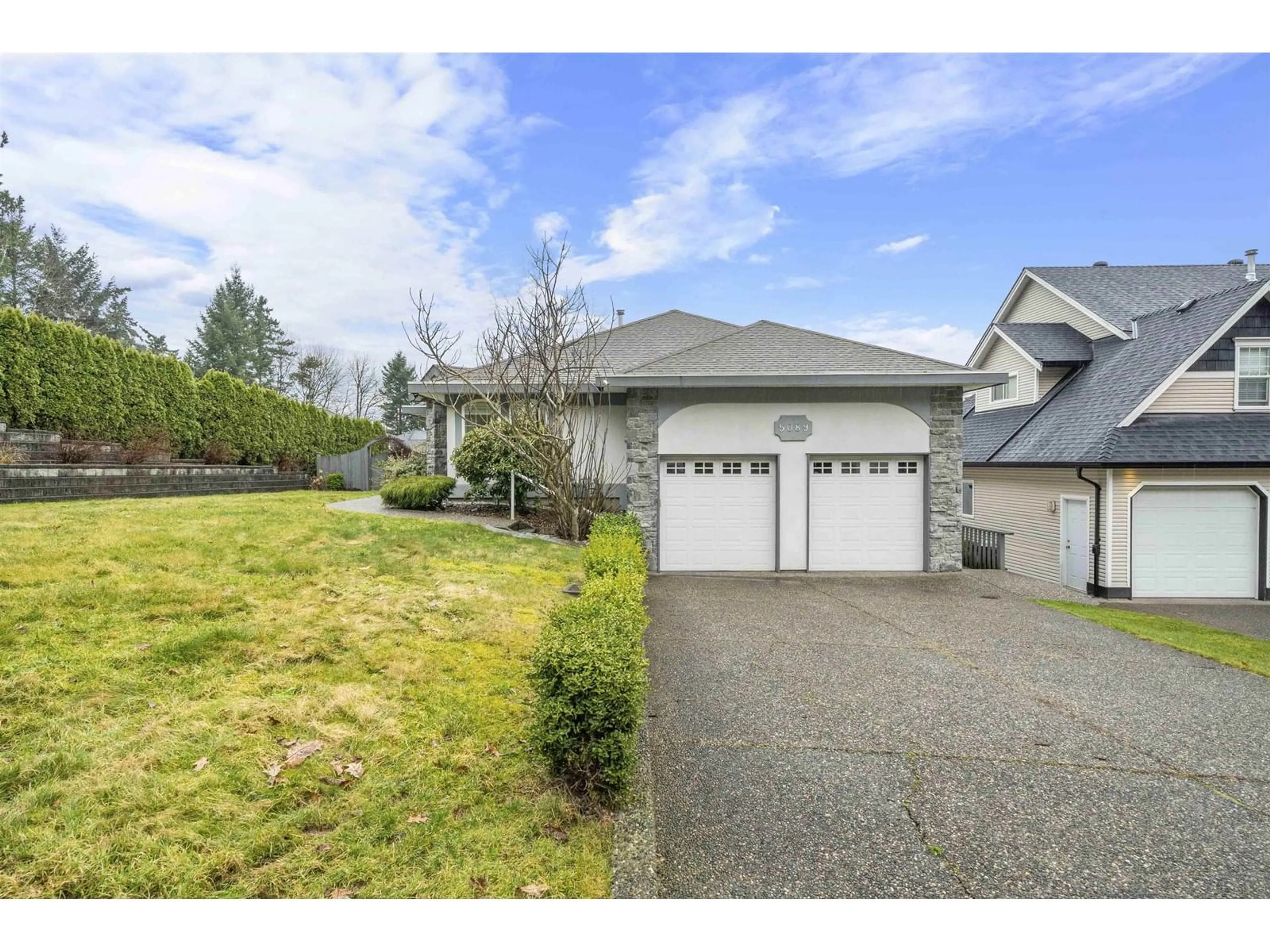A pic from outside/outdoor area/front of a property/back of a property/a pic from drone, street for 5089 219A, Langley British Columbia V3A8P8