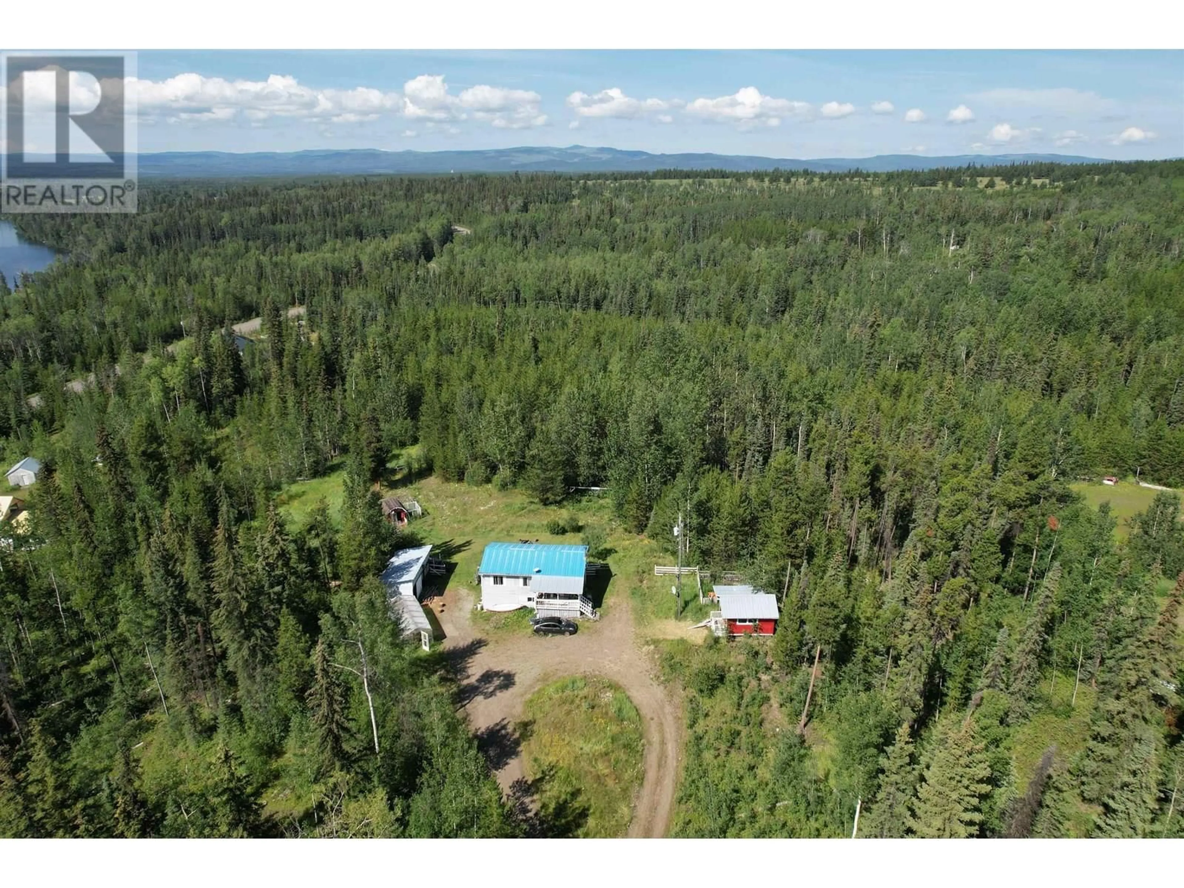A pic from outside/outdoor area/front of a property/back of a property/a pic from drone, forest/trees view for 1053 RAINBOW ROAD, Quesnel British Columbia V2J3H9