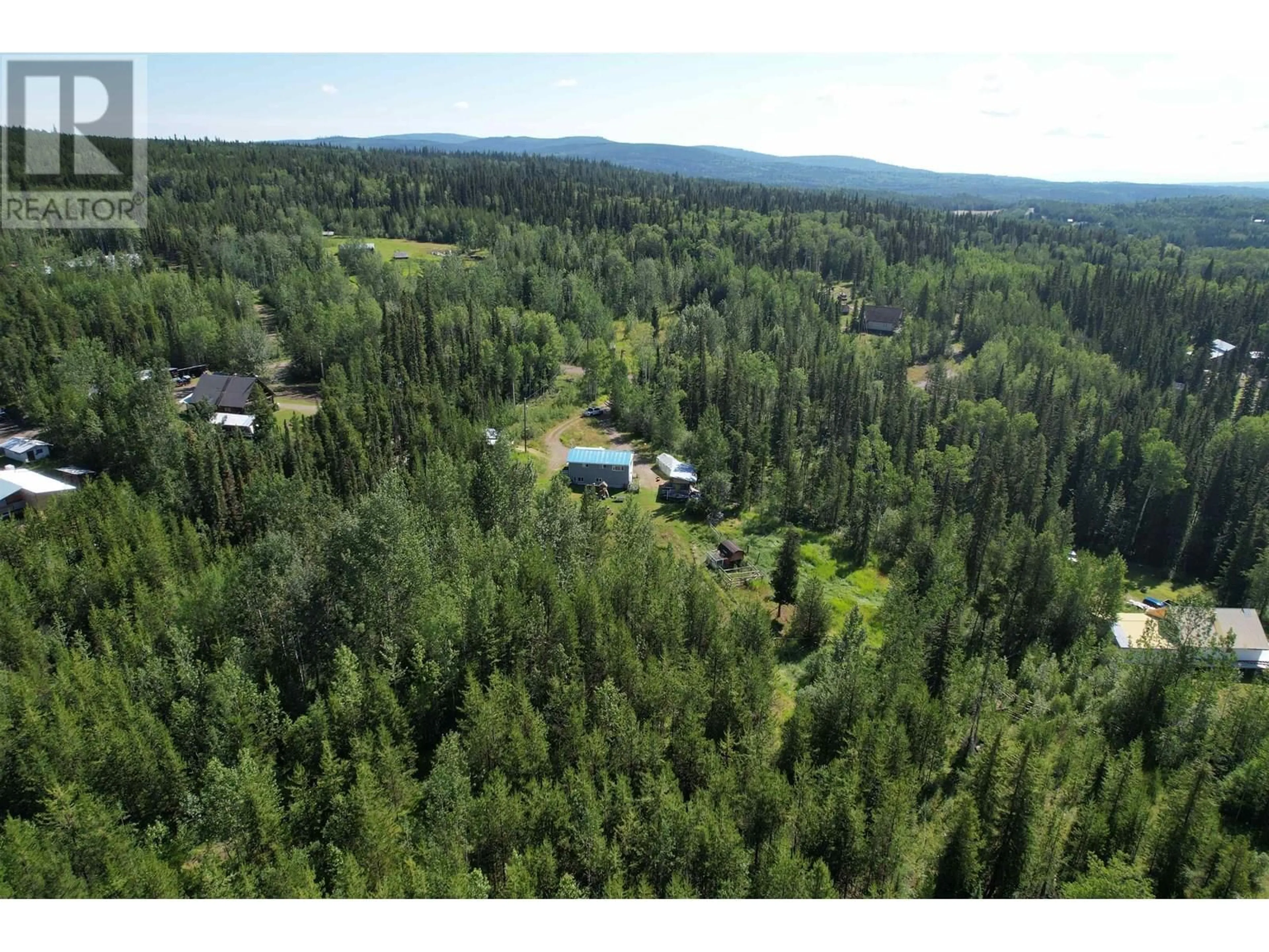 A pic from outside/outdoor area/front of a property/back of a property/a pic from drone, forest/trees view for 1053 RAINBOW ROAD, Quesnel British Columbia V2J3H9