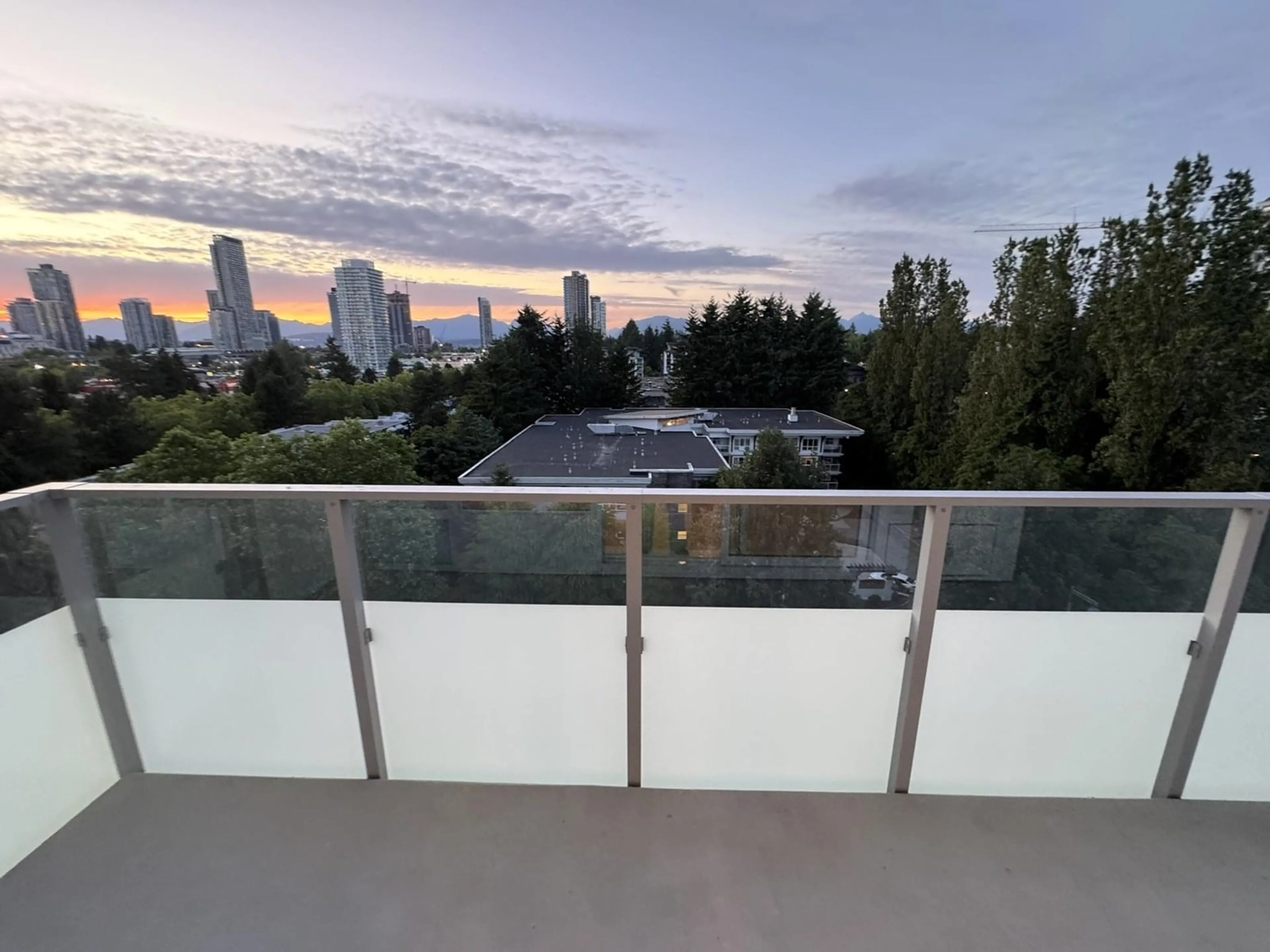 Balcony in the apartment, city buildings view from balcony for 1002 - 13778 100, Surrey British Columbia V3T0V3