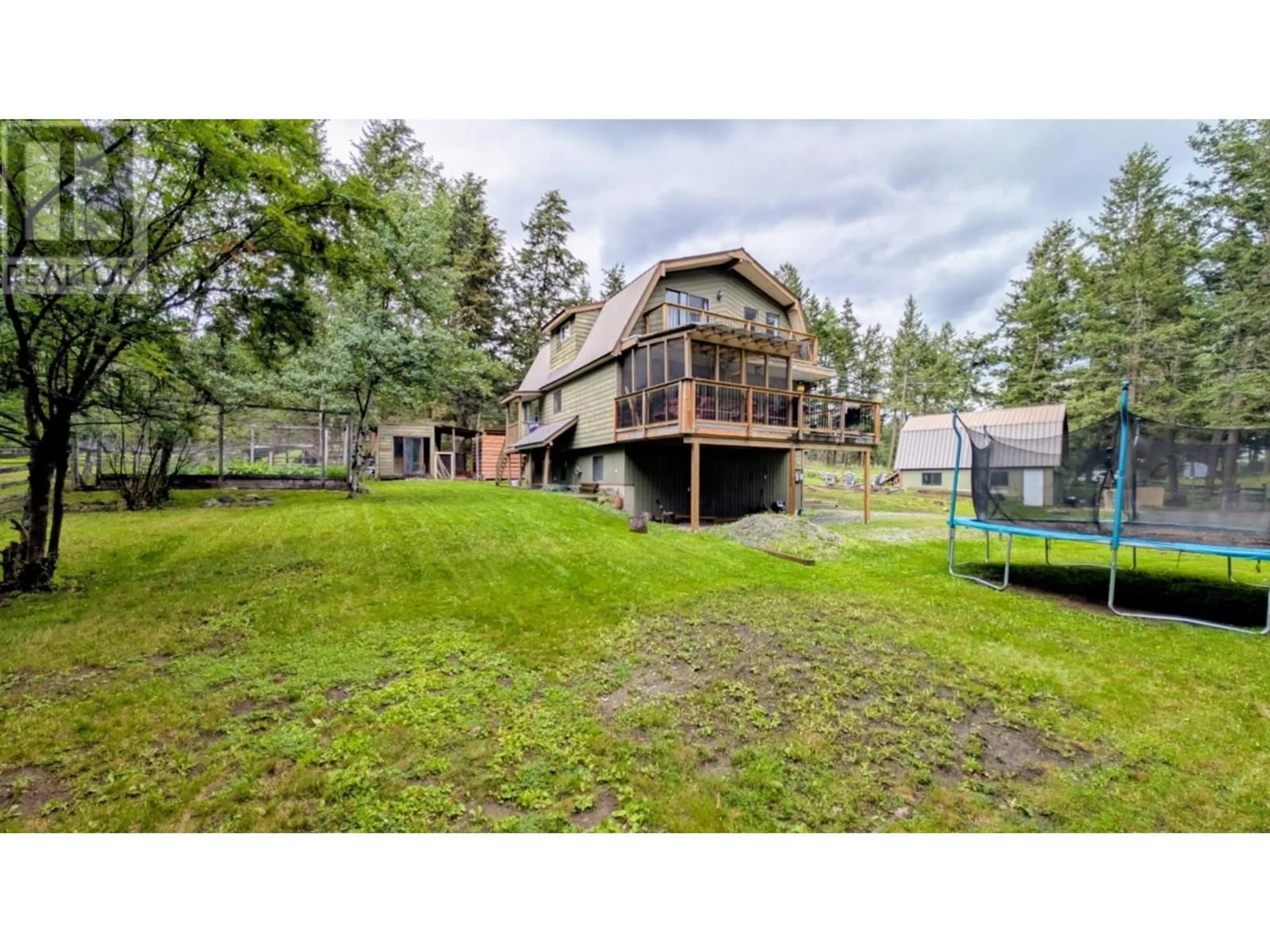 A pic from outside/outdoor area/front of a property/back of a property/a pic from drone, unknown for 4927 GLOINNZUN CRESCENT, 108 Mile Ranch British Columbia V0K2Z0