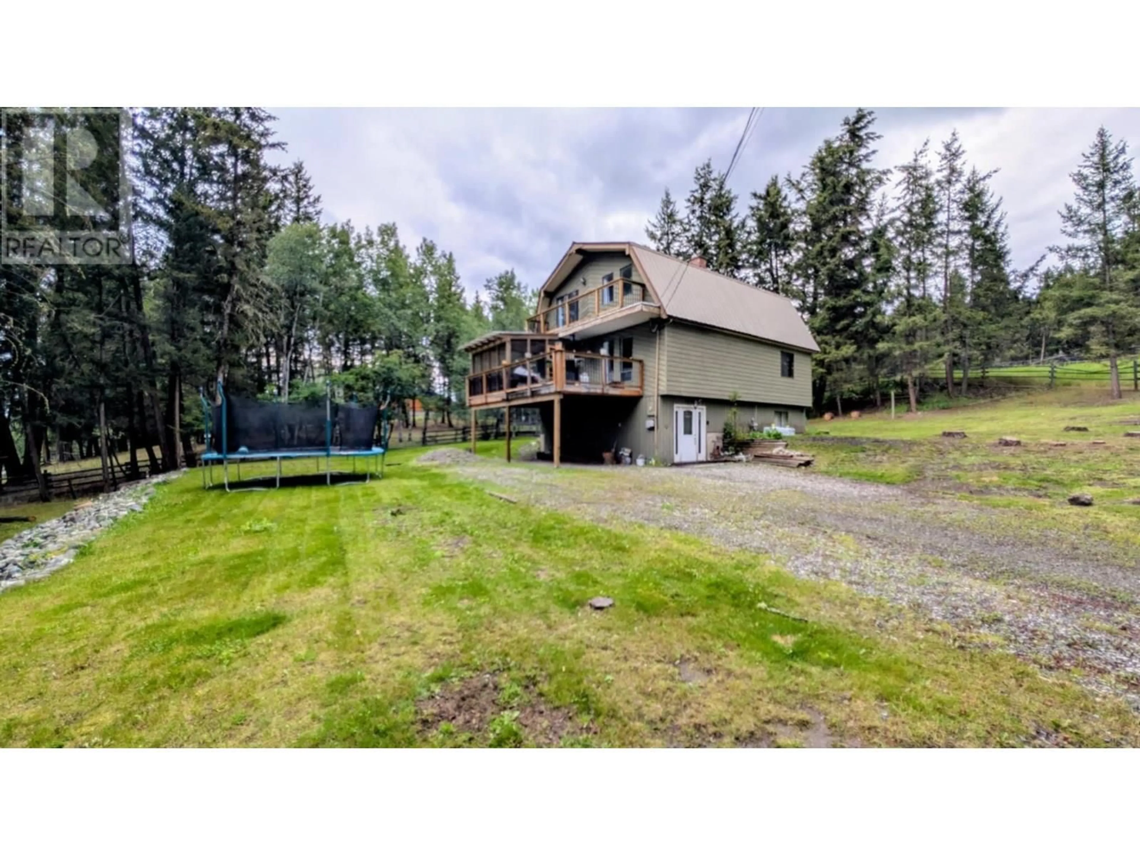 A pic from outside/outdoor area/front of a property/back of a property/a pic from drone, unknown for 4927 GLOINNZUN CRESCENT, 108 Mile Ranch British Columbia V0K2Z0