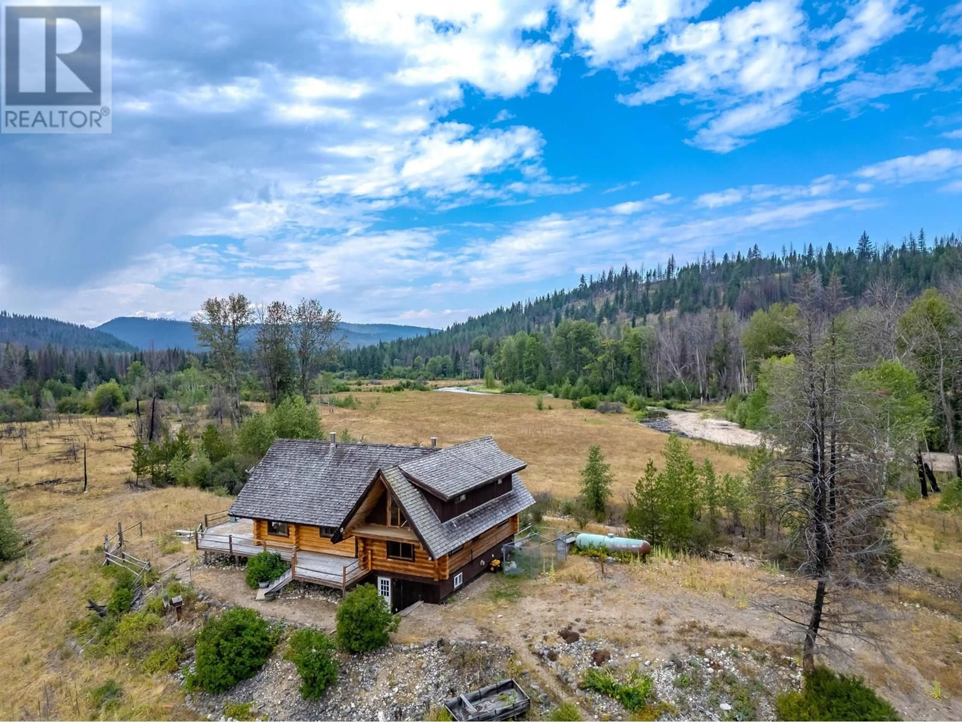 A pic from outside/outdoor area/front of a property/back of a property/a pic from drone, mountain view for 7900 BONAPARTE YOUNG LAKE ROAD, 70 Mile House British Columbia V0K2K2