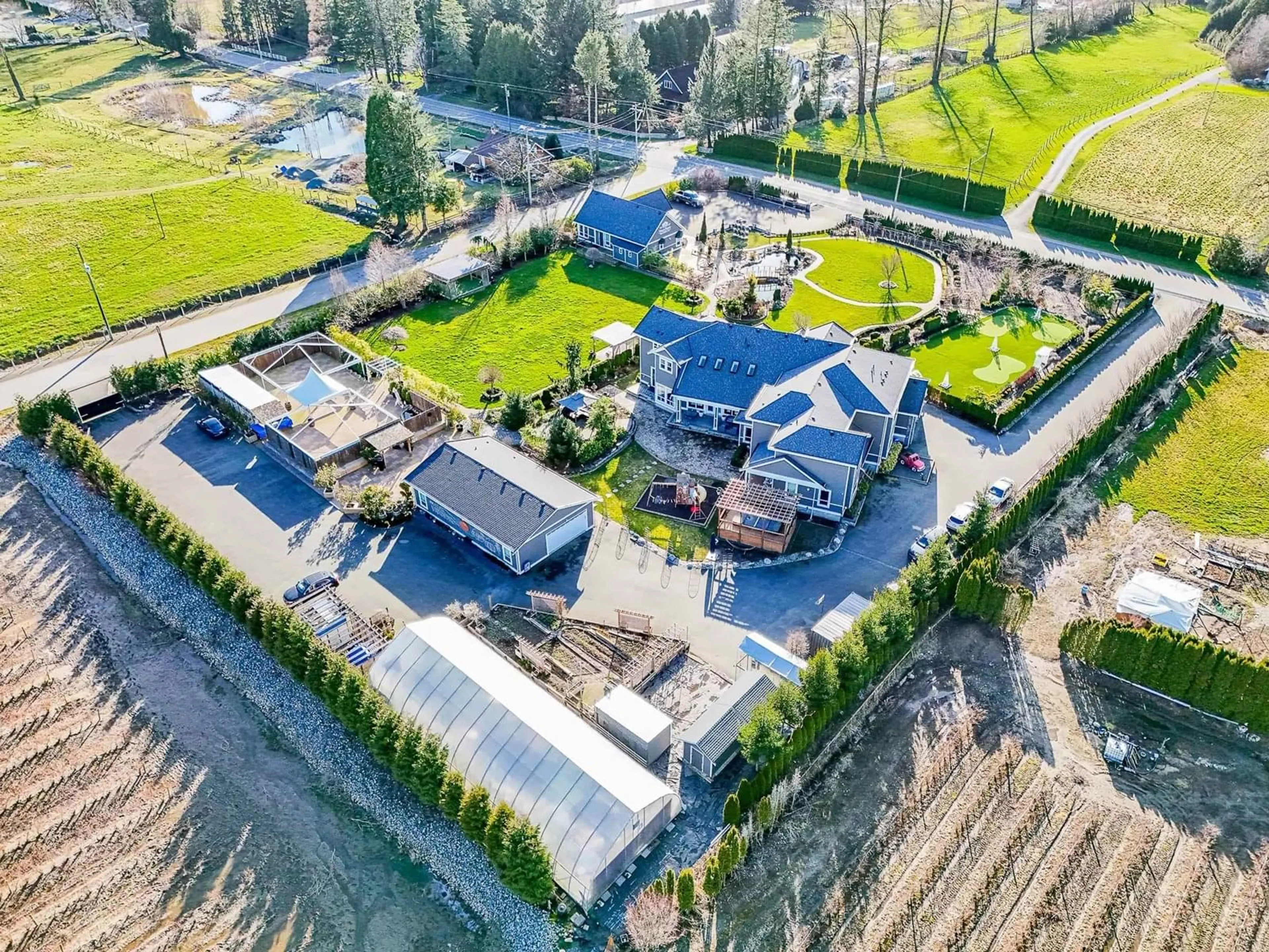A pic from outside/outdoor area/front of a property/back of a property/a pic from drone, unknown for 2218 240, Langley British Columbia V2Z3A4