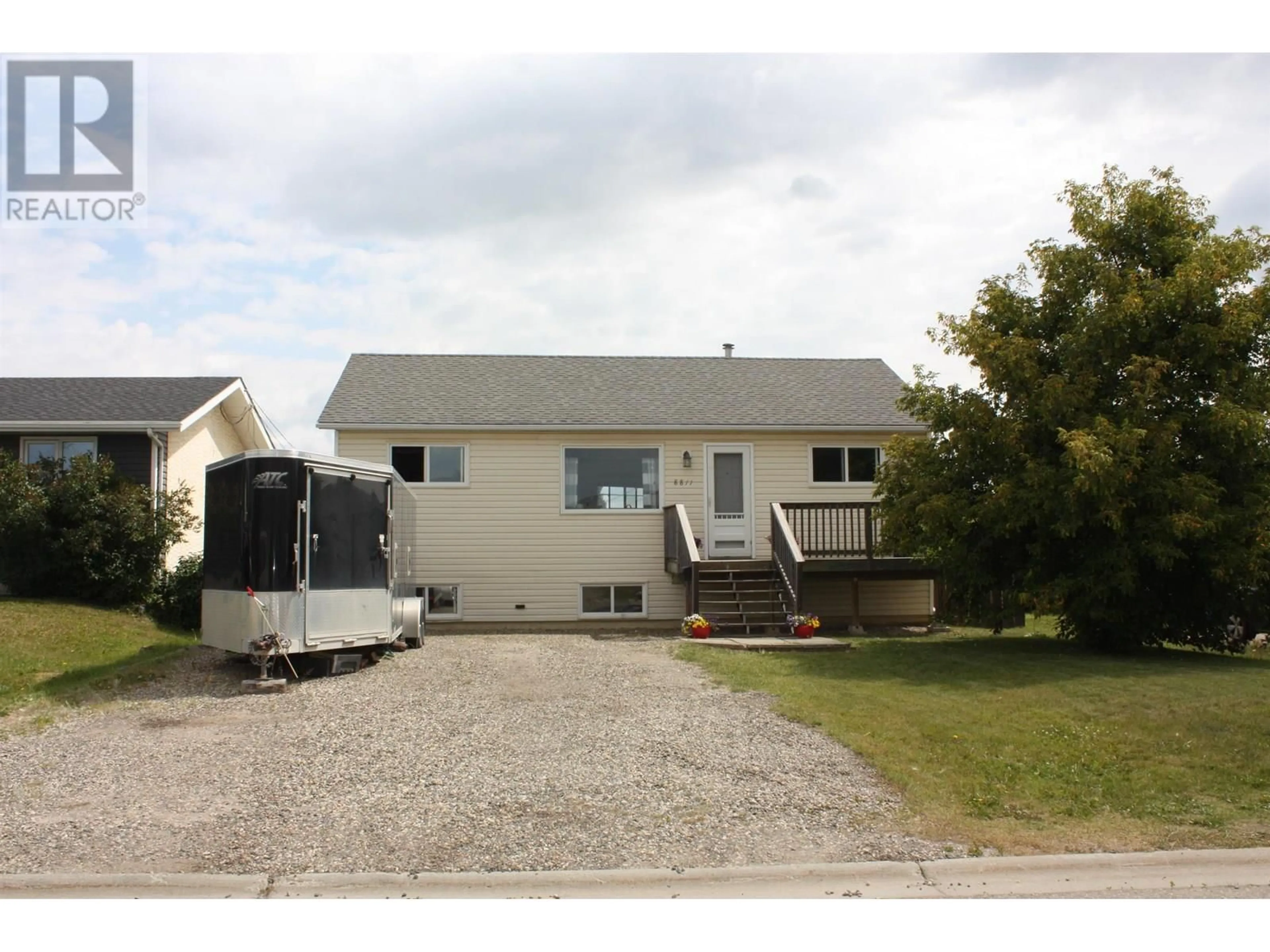 Home with vinyl exterior material, street for 8811 78A STREET, Fort St. John British Columbia V1J3B3