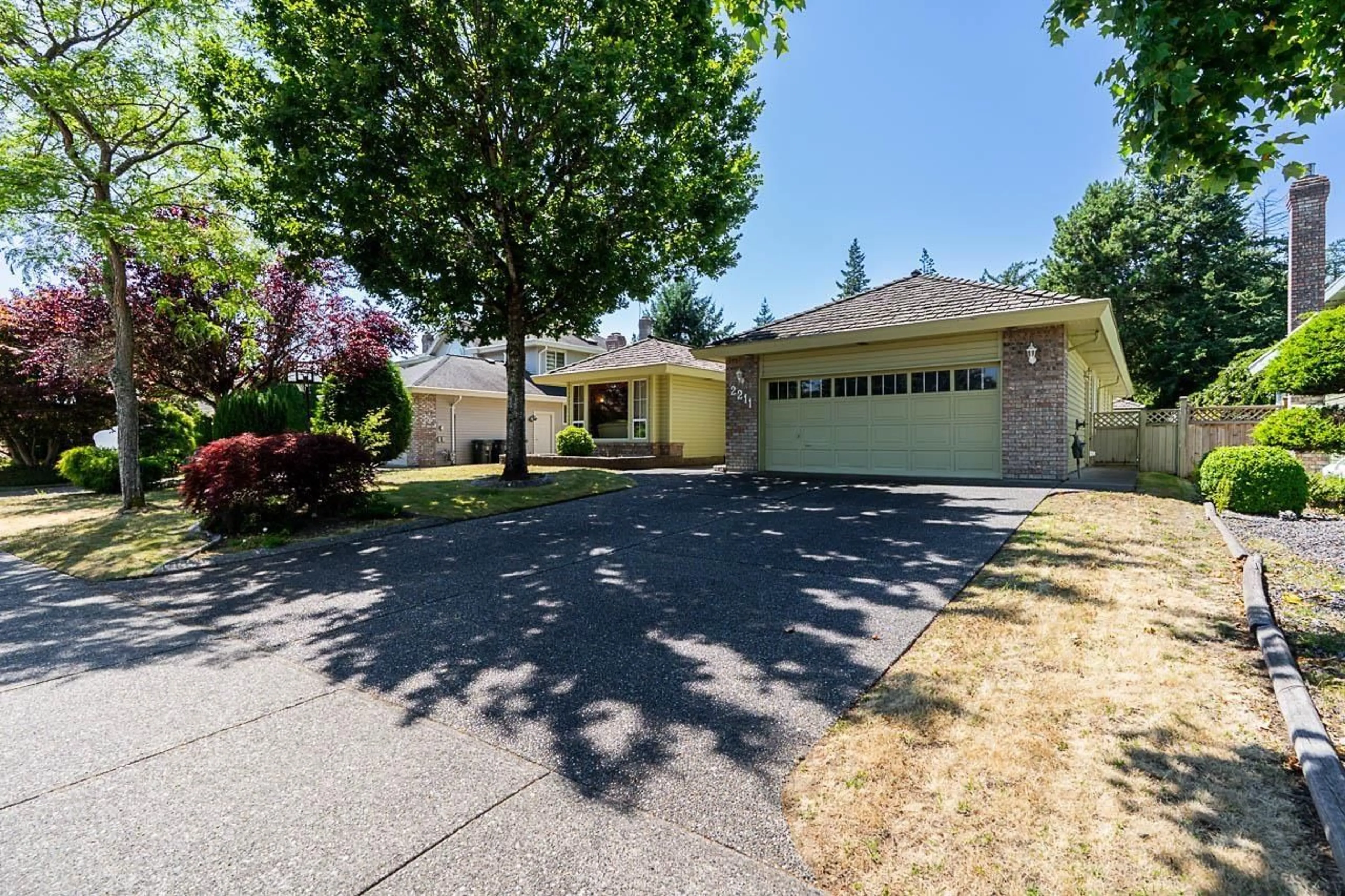 A pic from outside/outdoor area/front of a property/back of a property/a pic from drone, street for 2211 148A, Surrey British Columbia V4A9J2