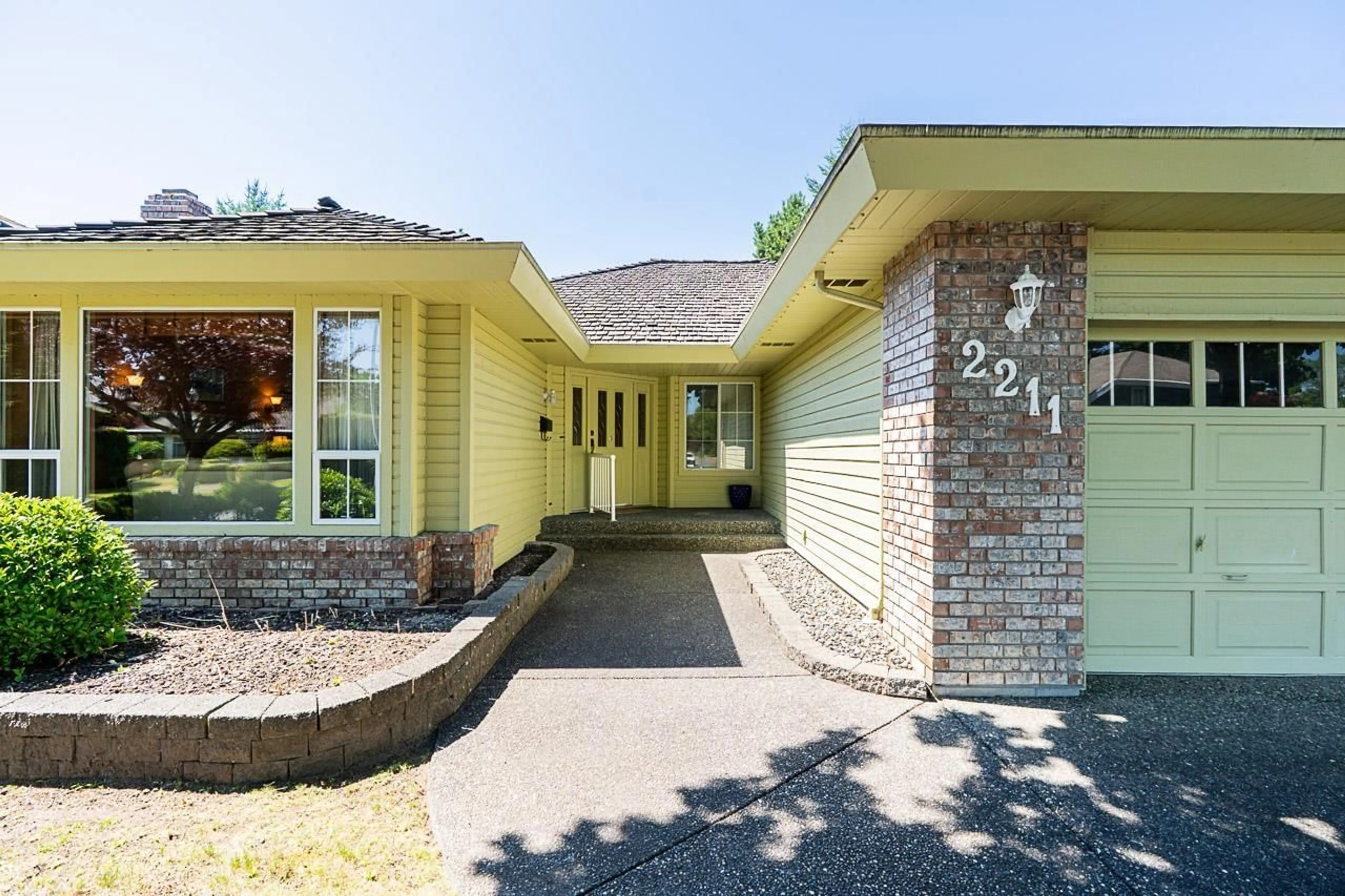 Home with brick exterior material, street for 2211 148A, Surrey British Columbia V4A9J2