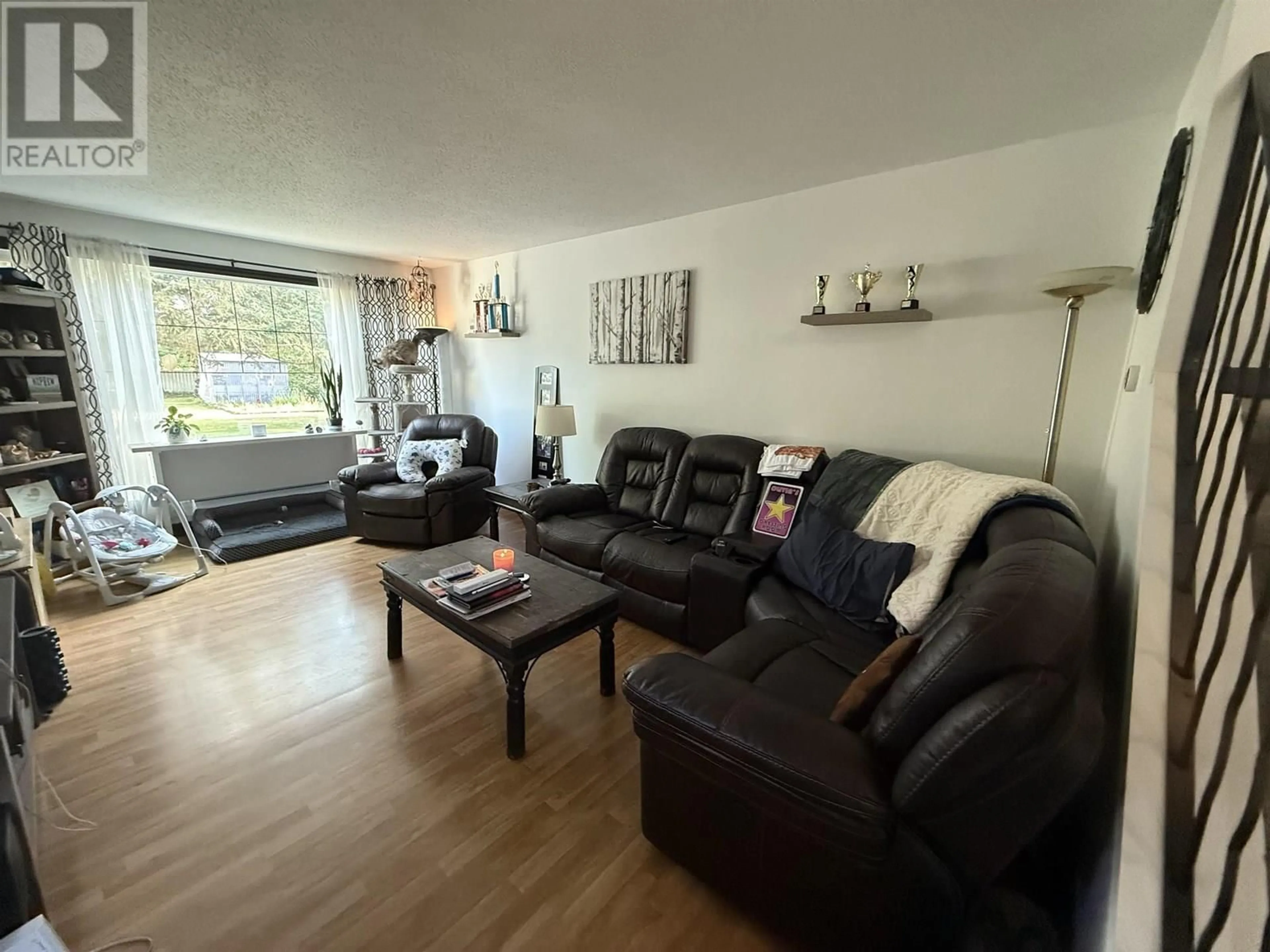 Living room with furniture, unknown for 9527 112 AVENUE, Fort St. John British Columbia V1J2W1