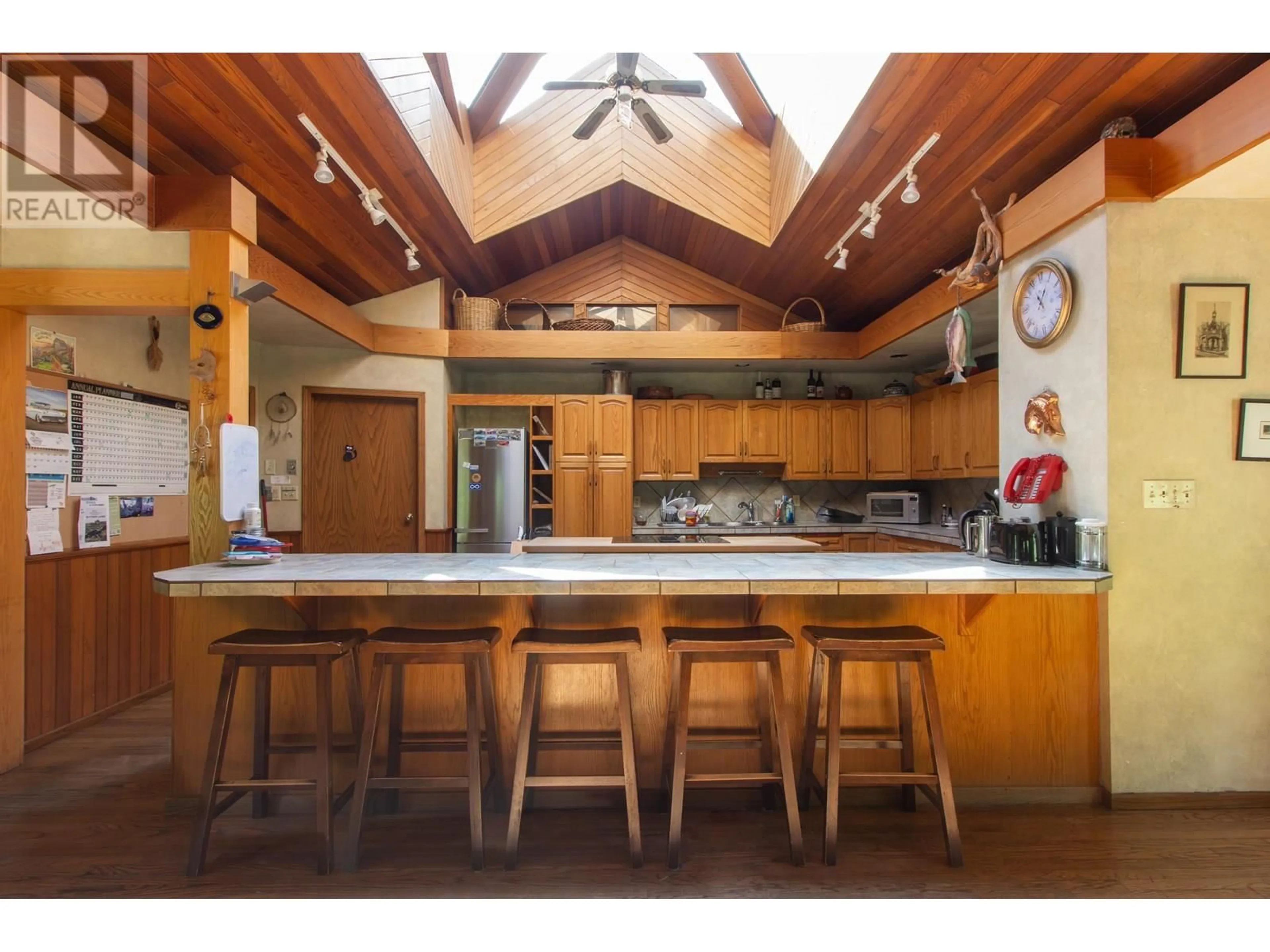 Open concept kitchen, unknown for 5071 PARADISE VALLEY ROAD, Squamish British Columbia V0N1T0