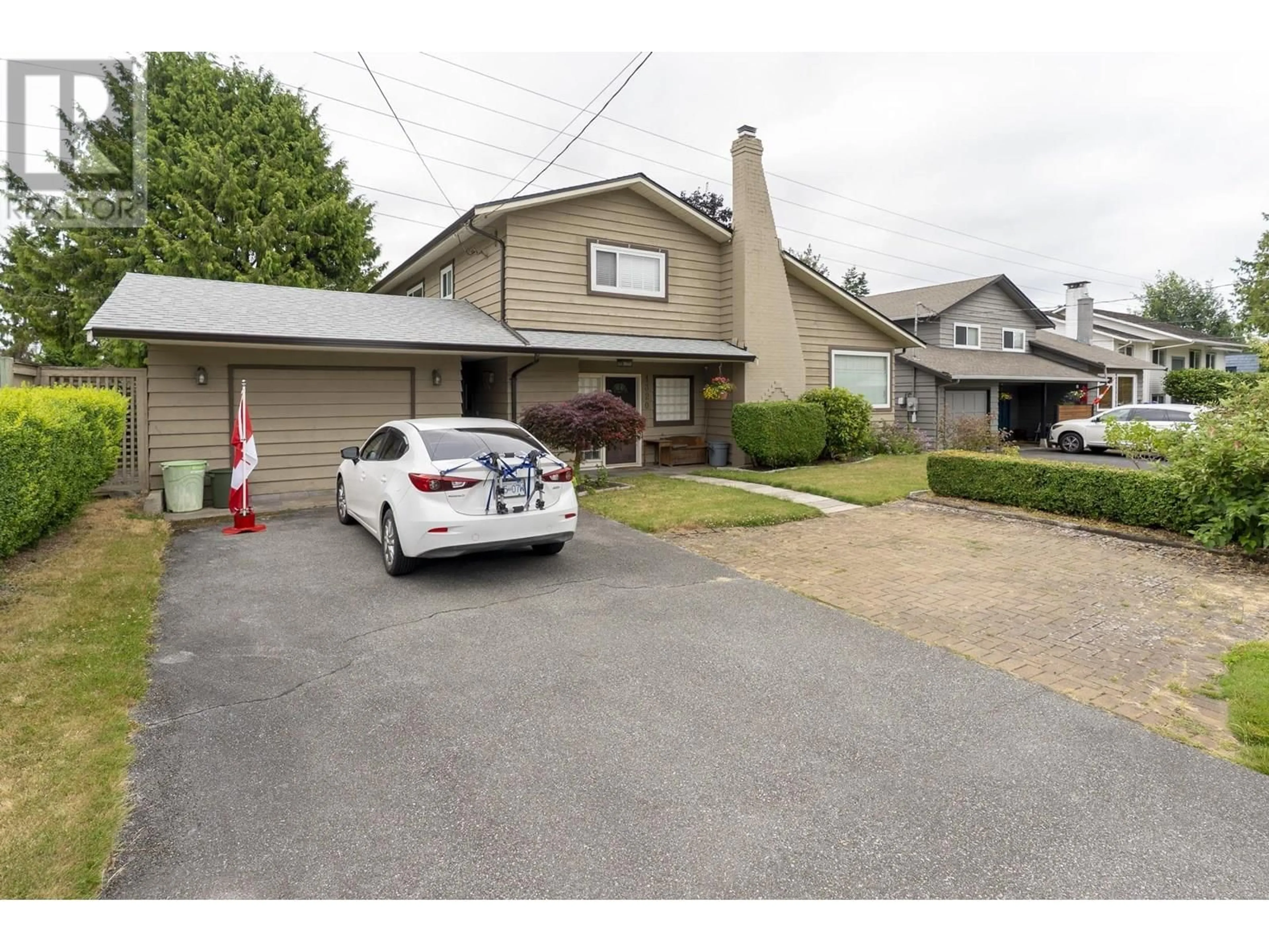 A pic from outside/outdoor area/front of a property/back of a property/a pic from drone, street for 1320 53A STREET, Delta British Columbia V4M3E6