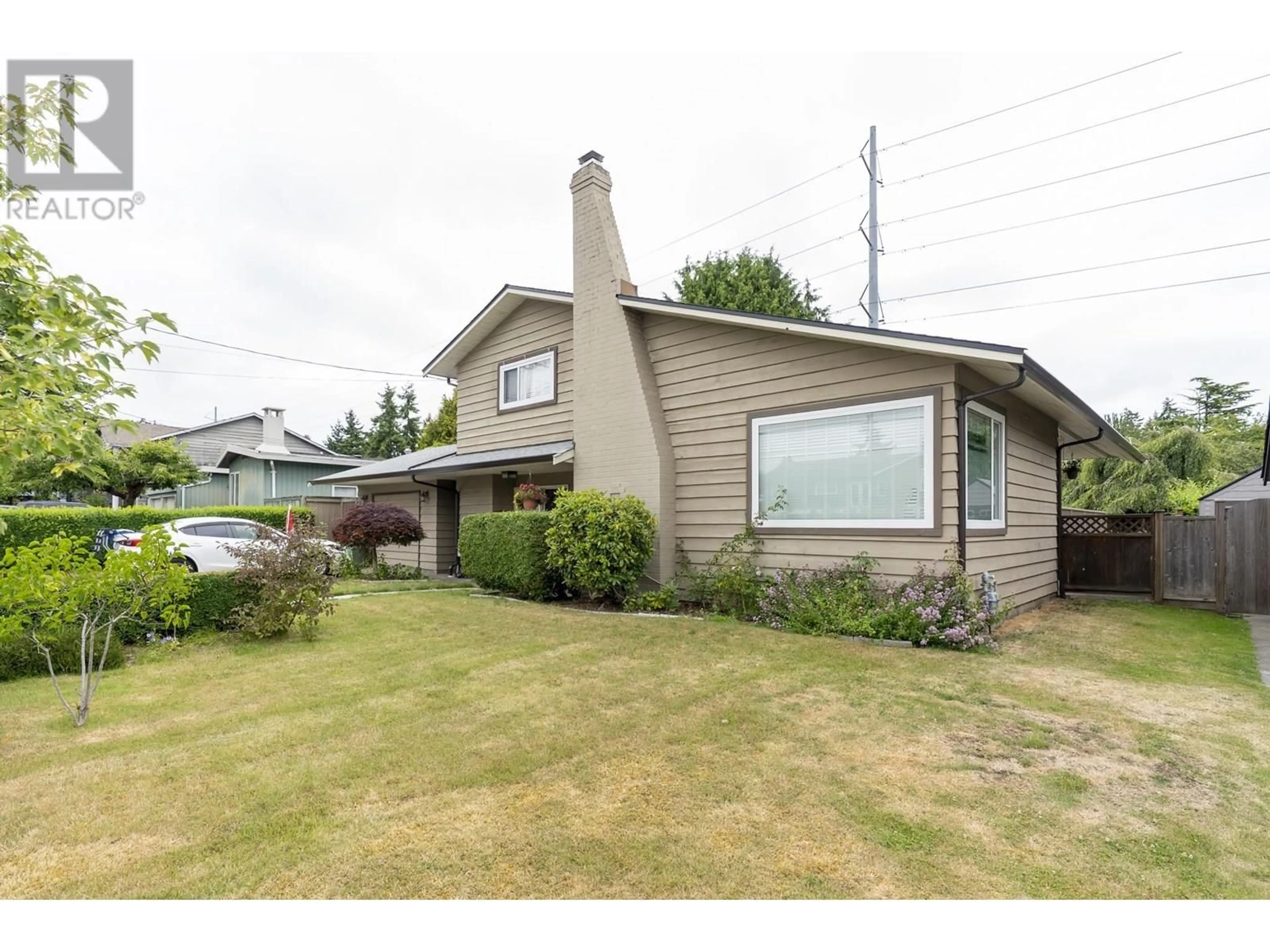 Home with vinyl exterior material, street for 1320 53A STREET, Delta British Columbia V4M3E6