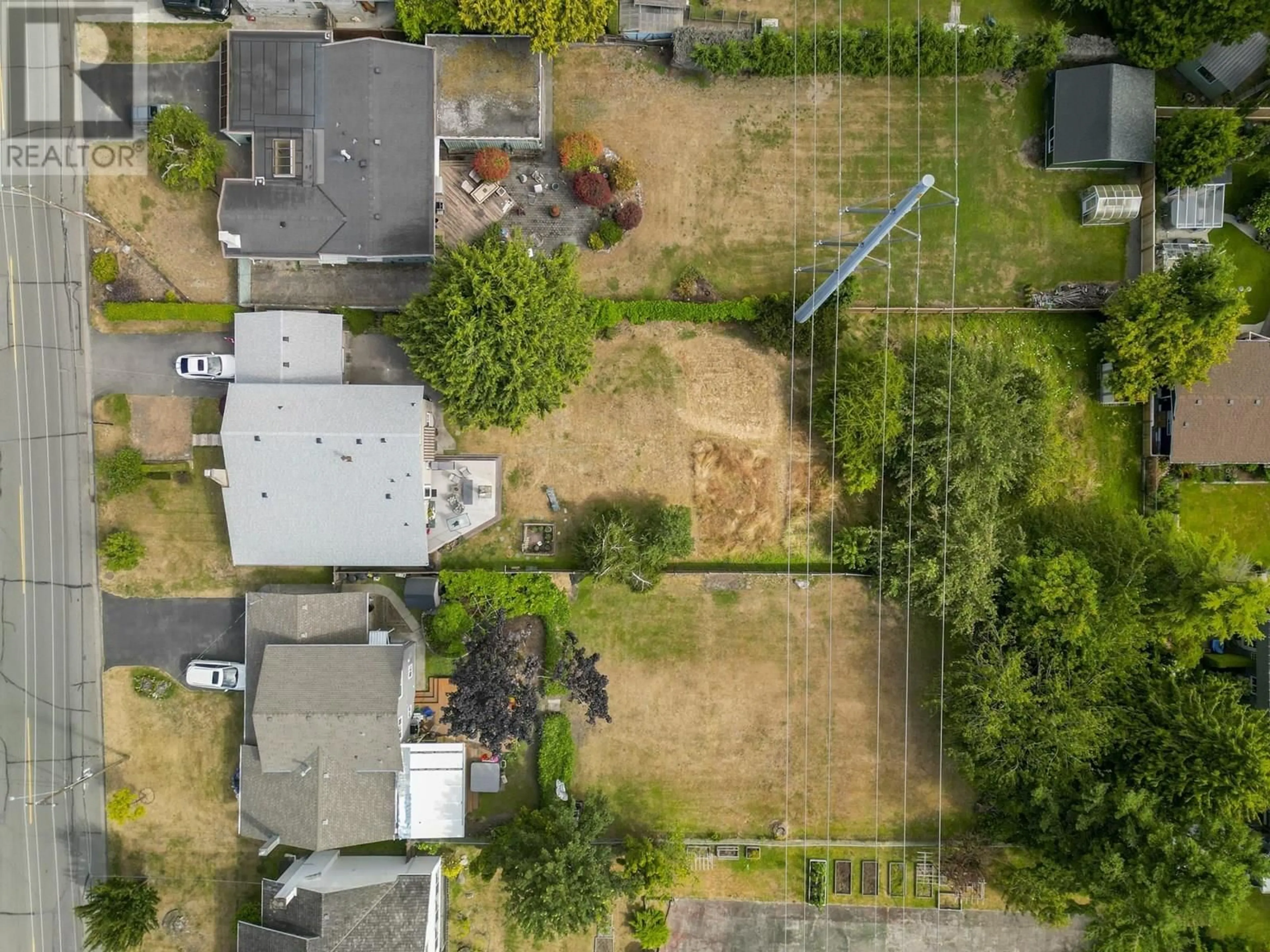 A pic from outside/outdoor area/front of a property/back of a property/a pic from drone, street for 1320 53A STREET, Delta British Columbia V4M3E6
