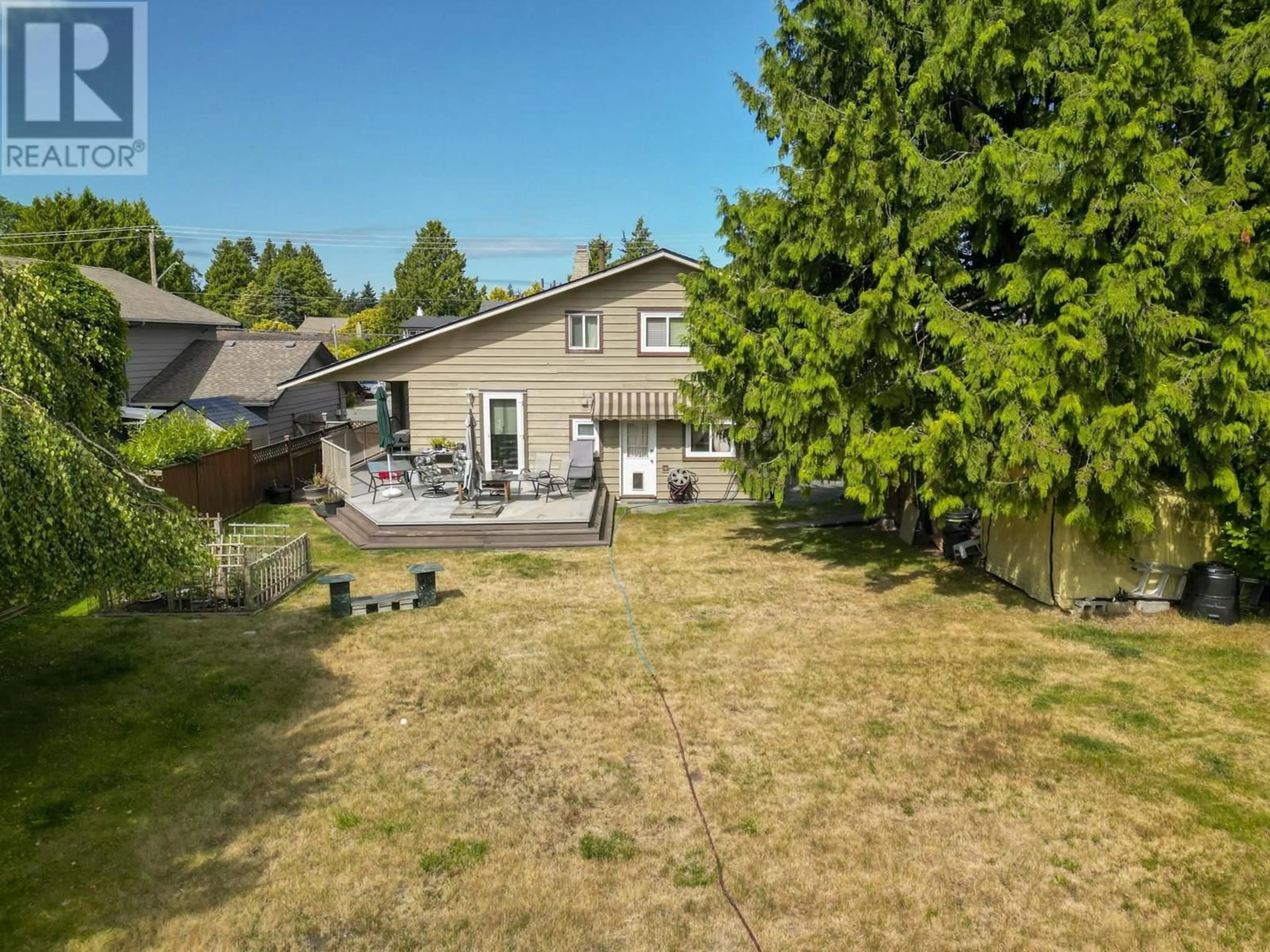 A pic from outside/outdoor area/front of a property/back of a property/a pic from drone, unknown for 1320 53A STREET, Delta British Columbia V4M3E6