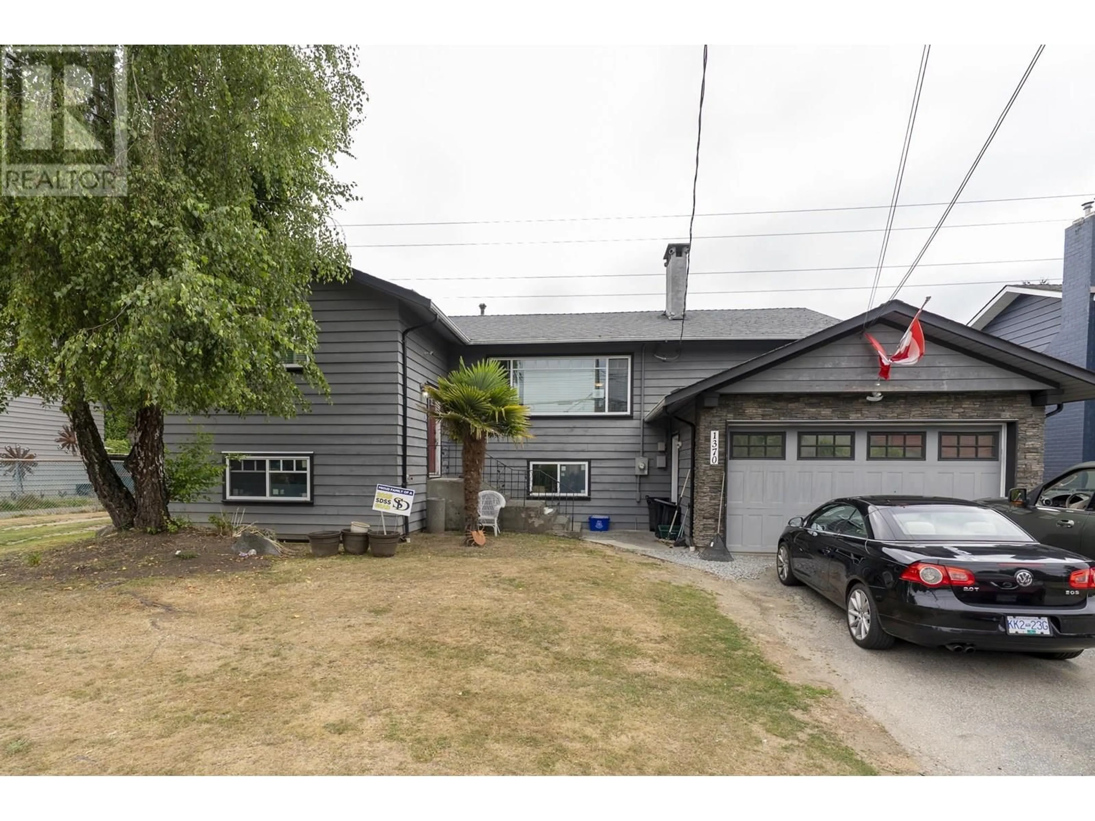 A pic from outside/outdoor area/front of a property/back of a property/a pic from drone, street for 1370 53A STREET, Delta British Columbia V4M3E6