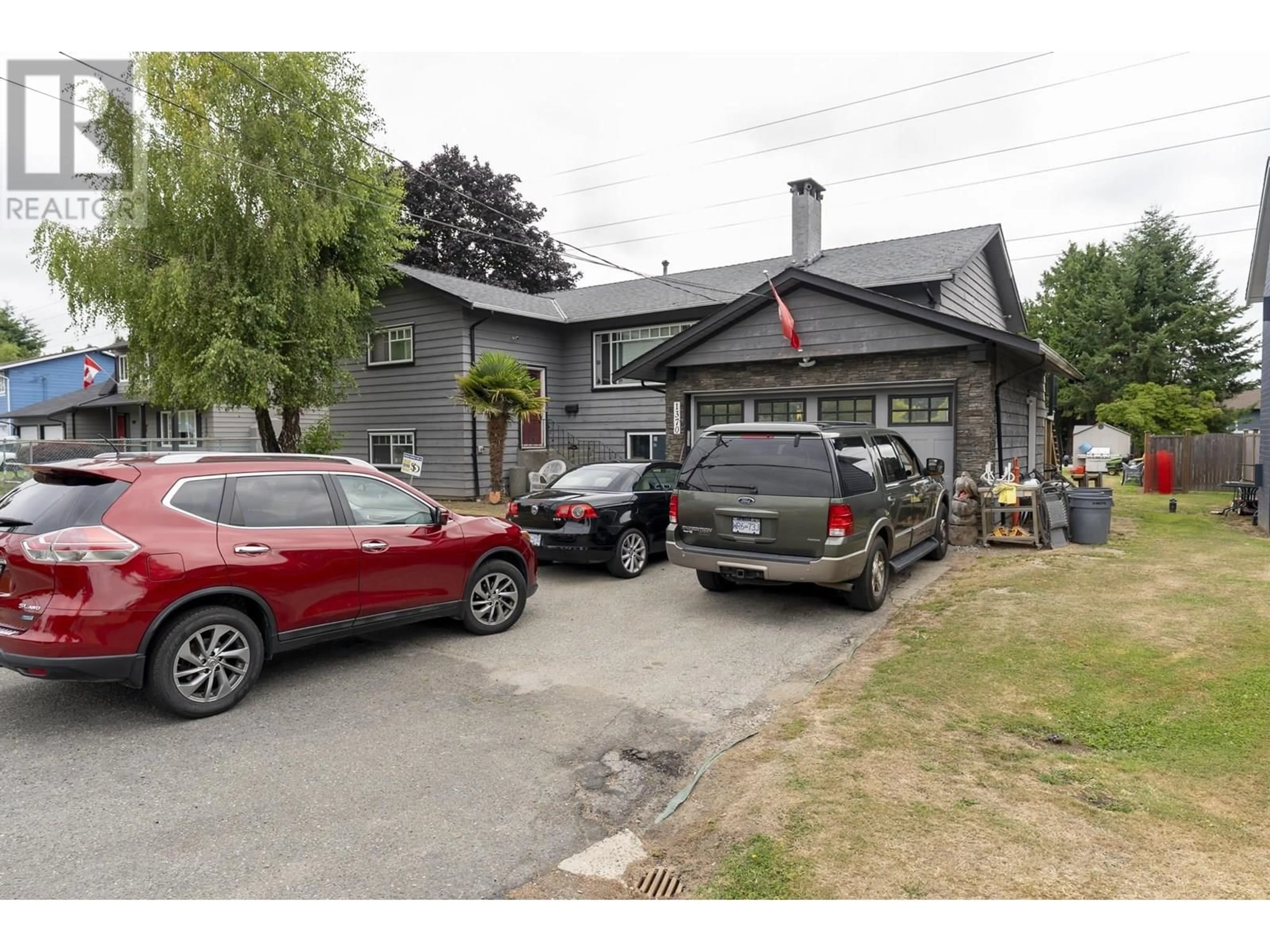 A pic from outside/outdoor area/front of a property/back of a property/a pic from drone, street for 1370 53A STREET, Delta British Columbia V4M3E6