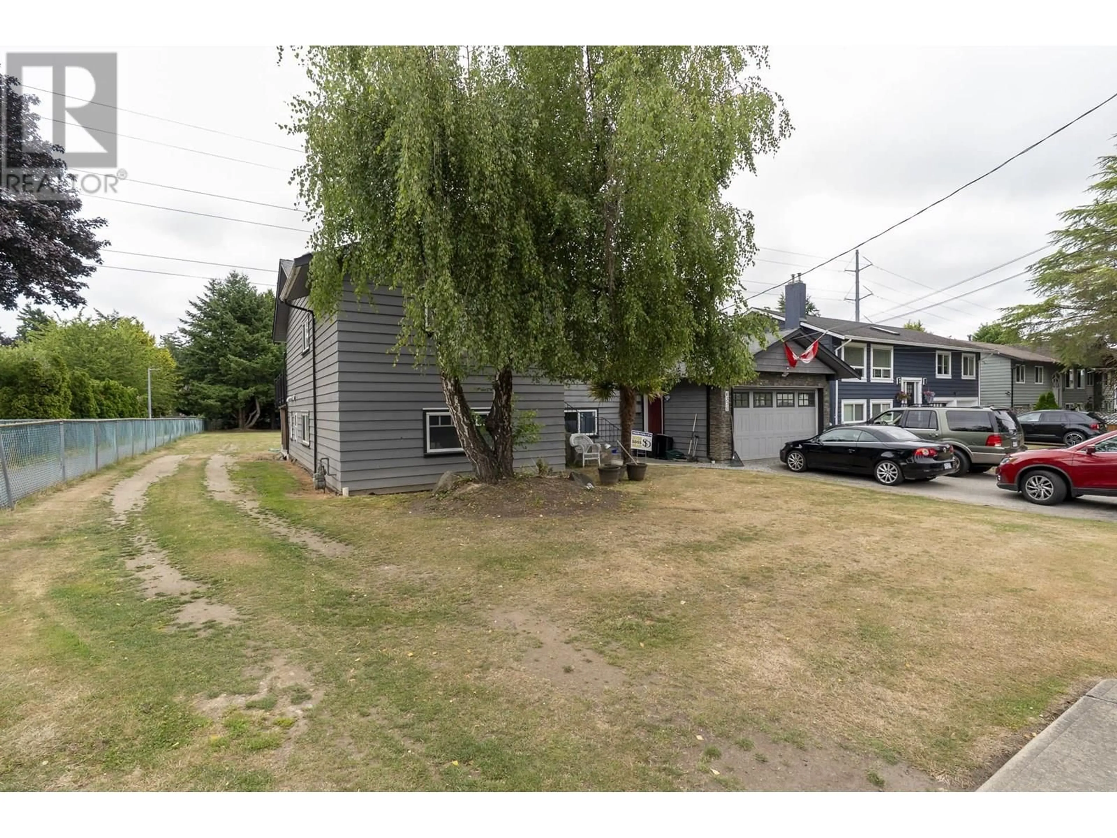 A pic from outside/outdoor area/front of a property/back of a property/a pic from drone, street for 1370 53A STREET, Delta British Columbia V4M3E6