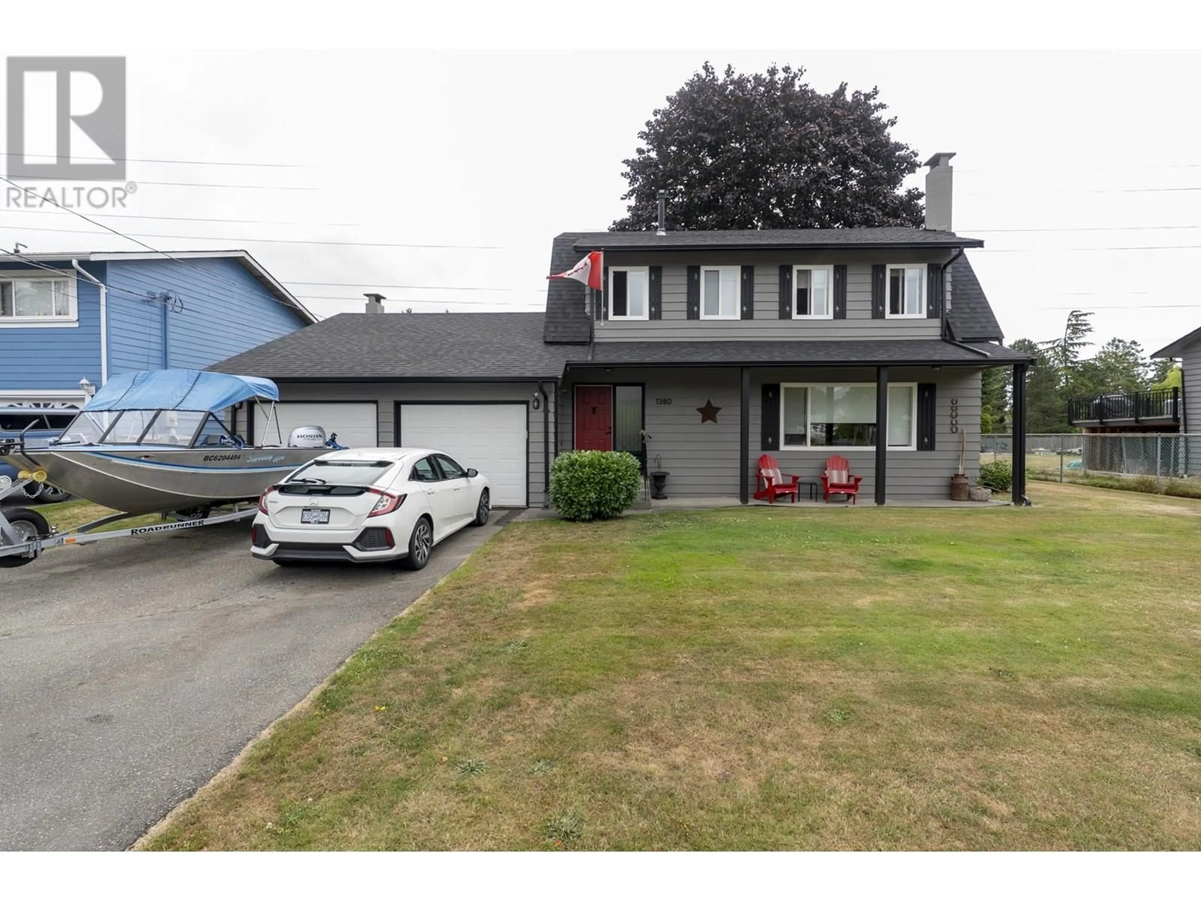 A pic from outside/outdoor area/front of a property/back of a property/a pic from drone, street for 1380 53A STREET, Delta British Columbia V4M3E6