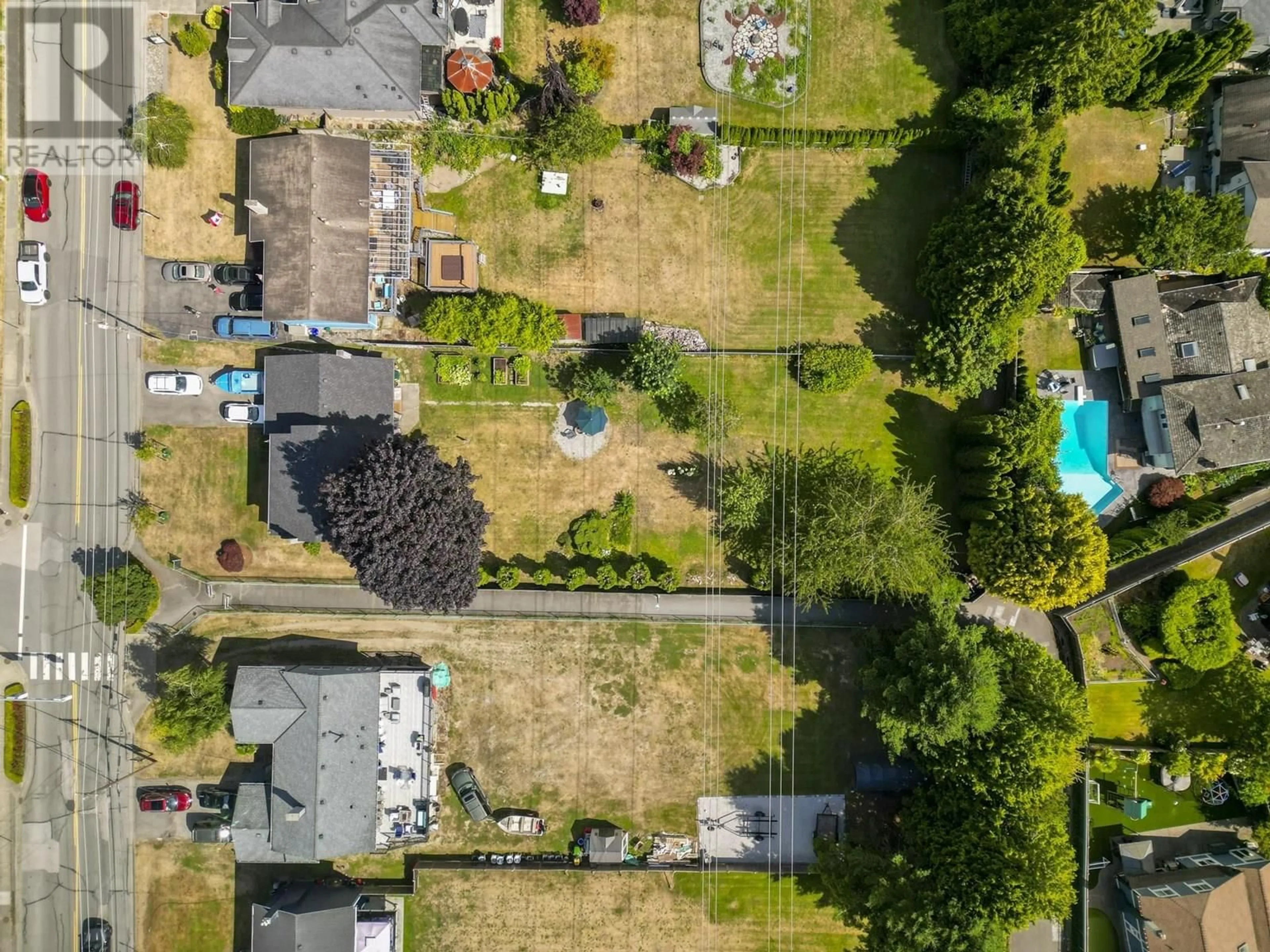 A pic from outside/outdoor area/front of a property/back of a property/a pic from drone, street for 1380 53A STREET, Delta British Columbia V4M3E6