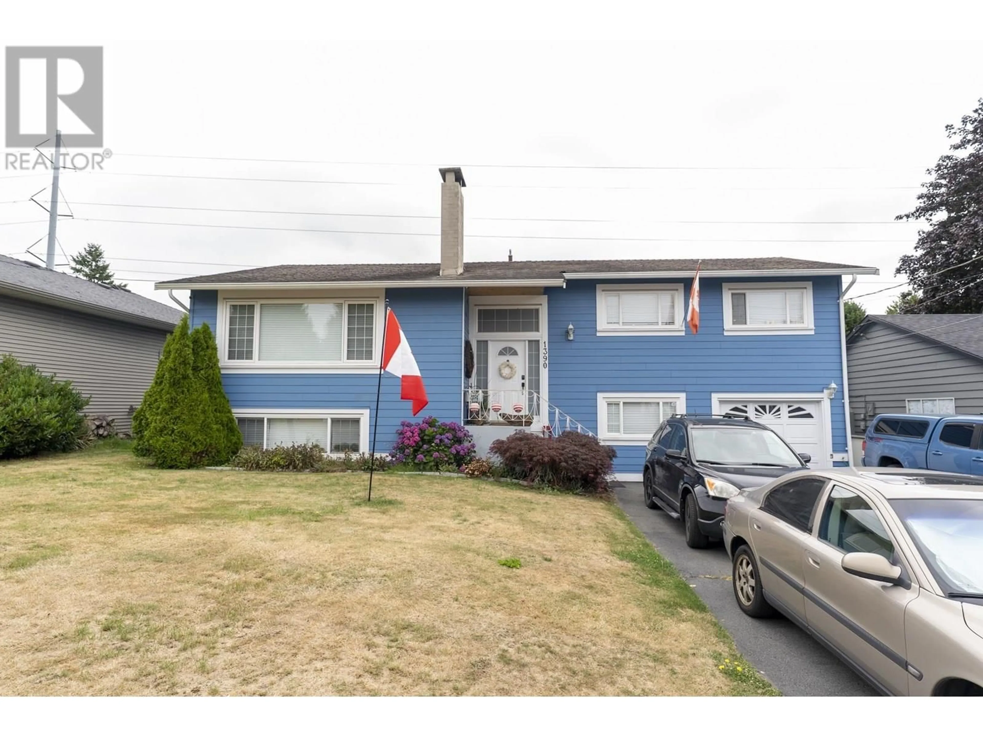 Home with vinyl exterior material, street for 1390 53A STREET, Delta British Columbia V4M3E6