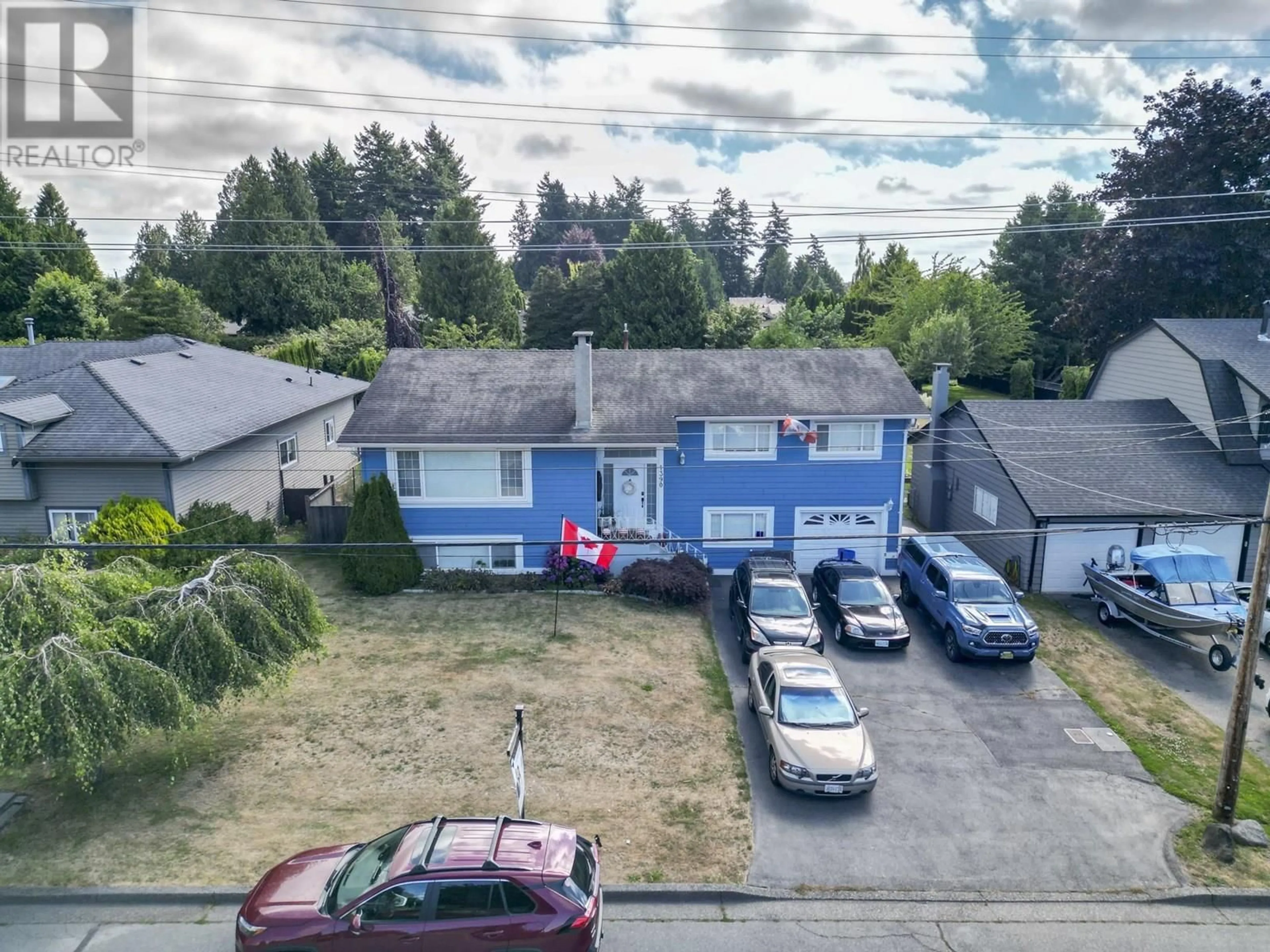 A pic from outside/outdoor area/front of a property/back of a property/a pic from drone, street for 1390 53A STREET, Delta British Columbia V4M3E6