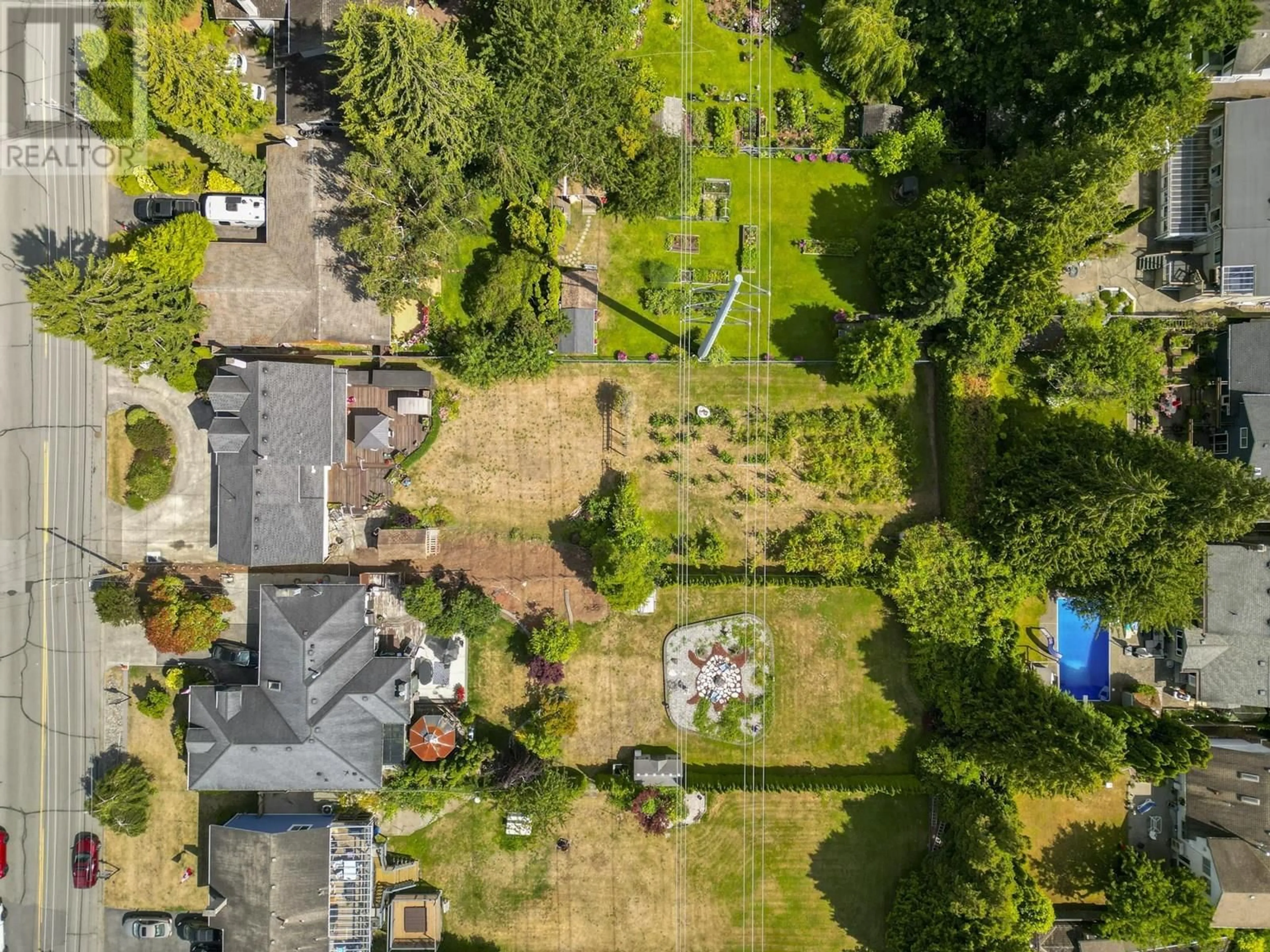 A pic from outside/outdoor area/front of a property/back of a property/a pic from drone, street for 1390 53A STREET, Delta British Columbia V4M3E6