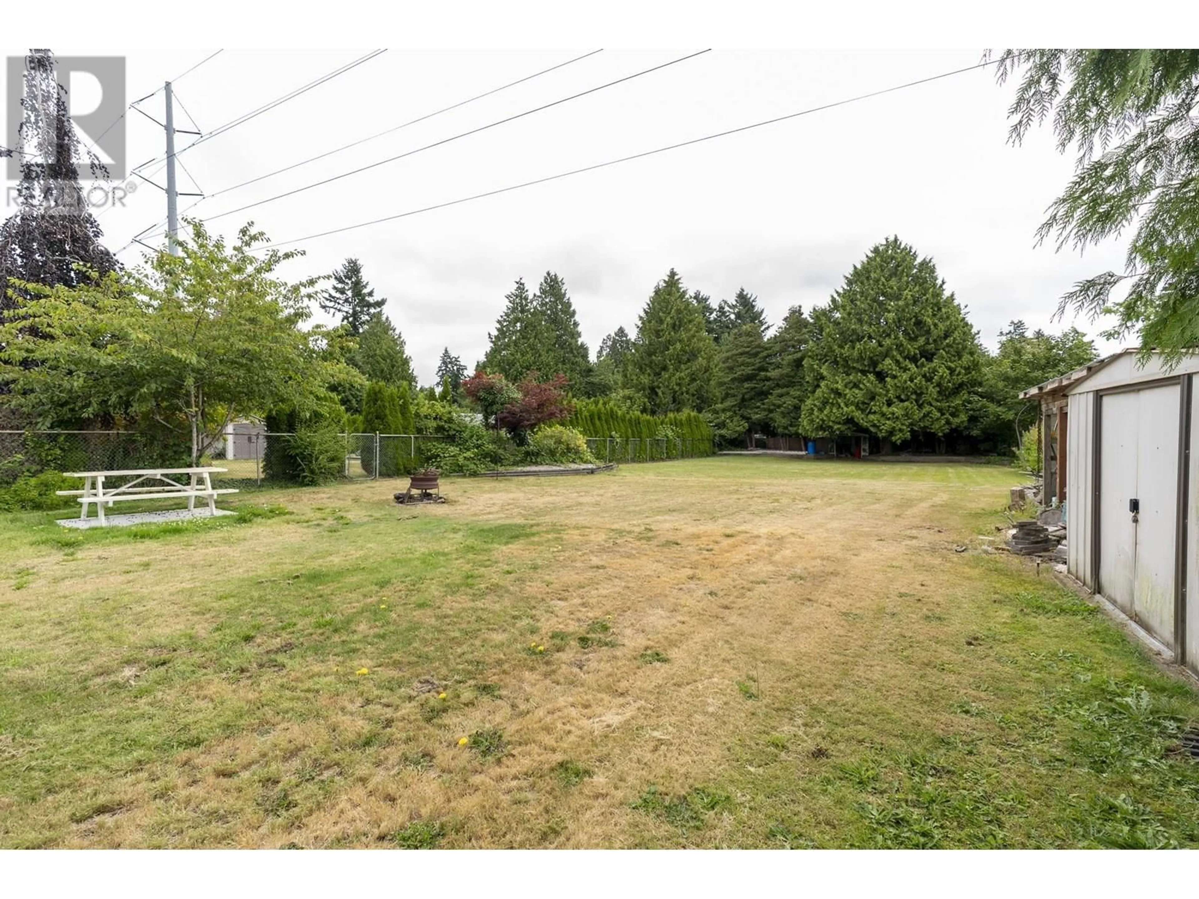 A pic from outside/outdoor area/front of a property/back of a property/a pic from drone, unknown for 1390 53A STREET, Delta British Columbia V4M3E6