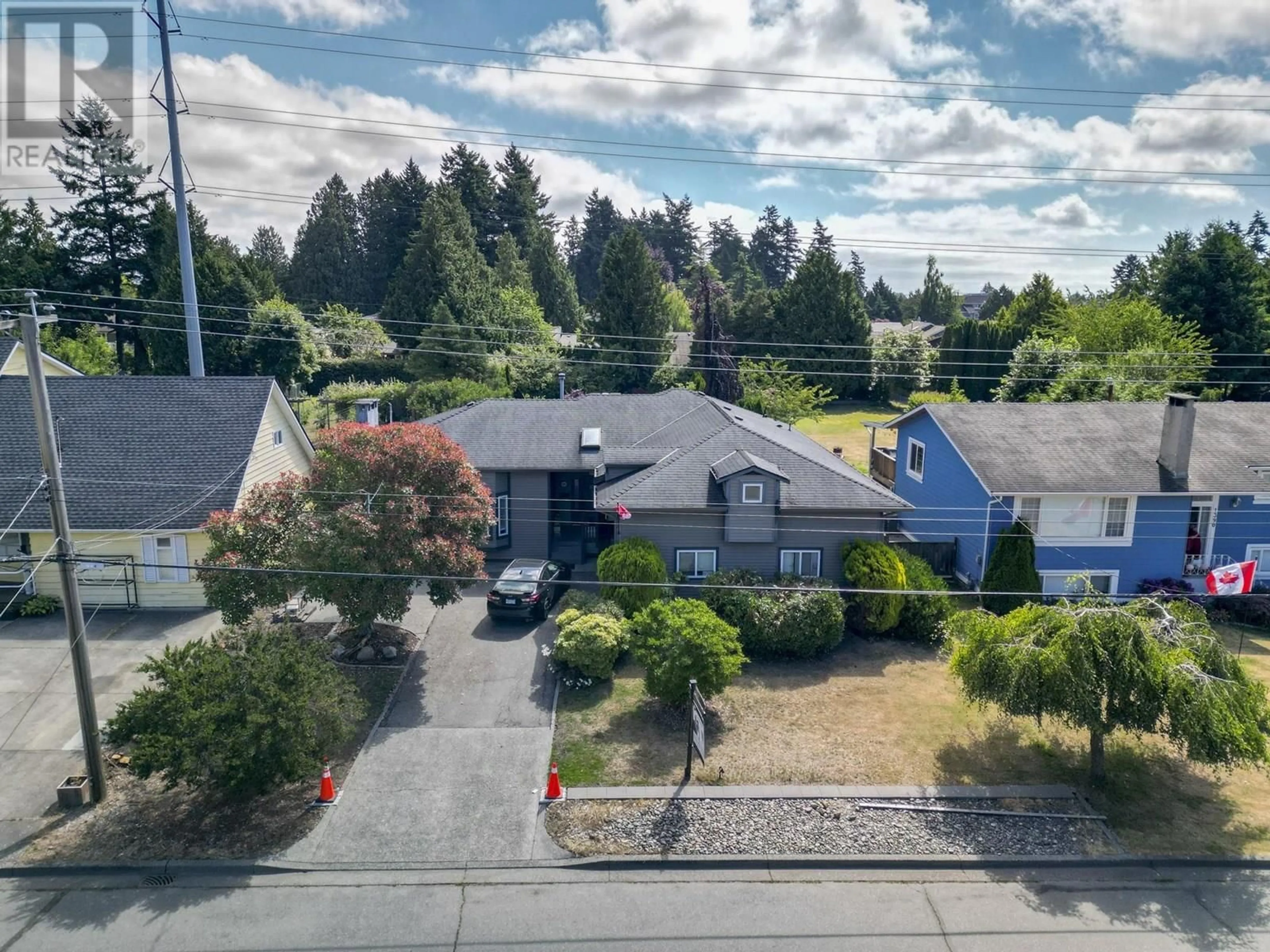 A pic from outside/outdoor area/front of a property/back of a property/a pic from drone, street for 1400 53A STREET, Delta British Columbia V4M3E6