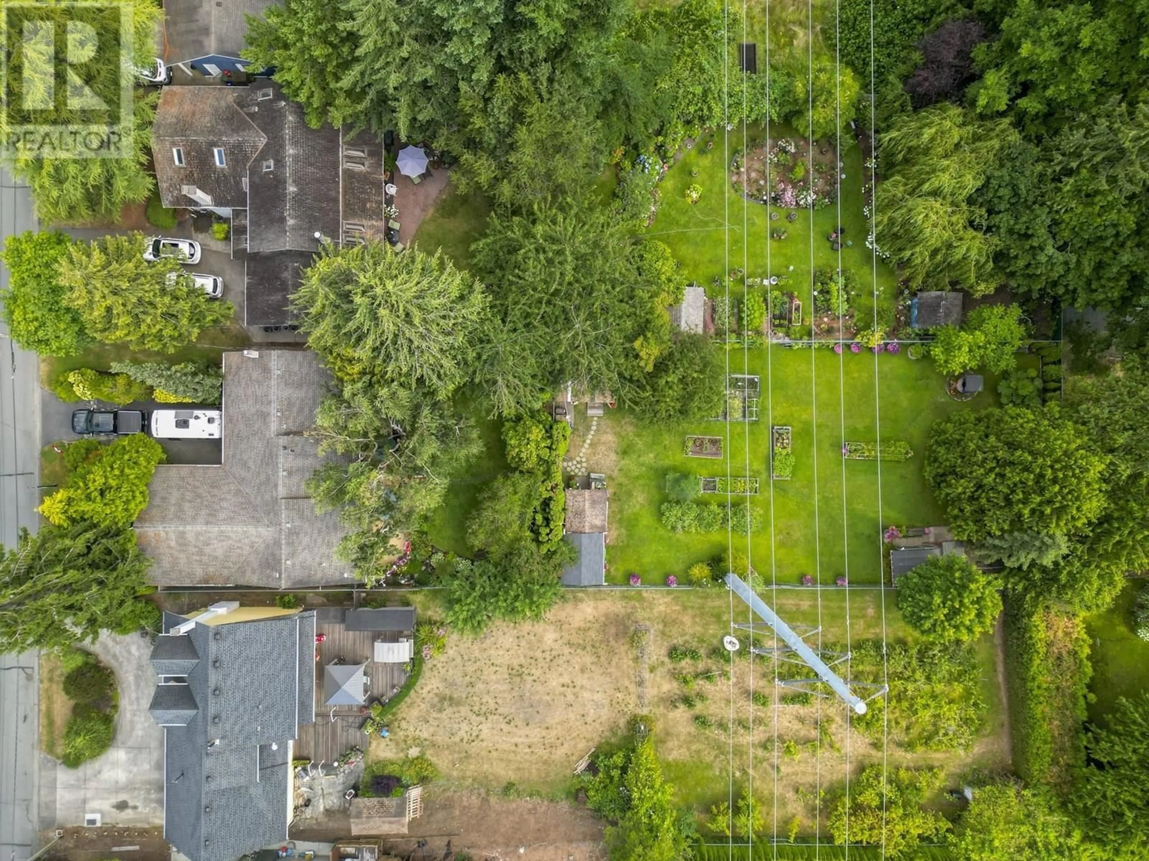 A pic from outside/outdoor area/front of a property/back of a property/a pic from drone, street for 1404 53A STREET, Delta British Columbia V4M3E6