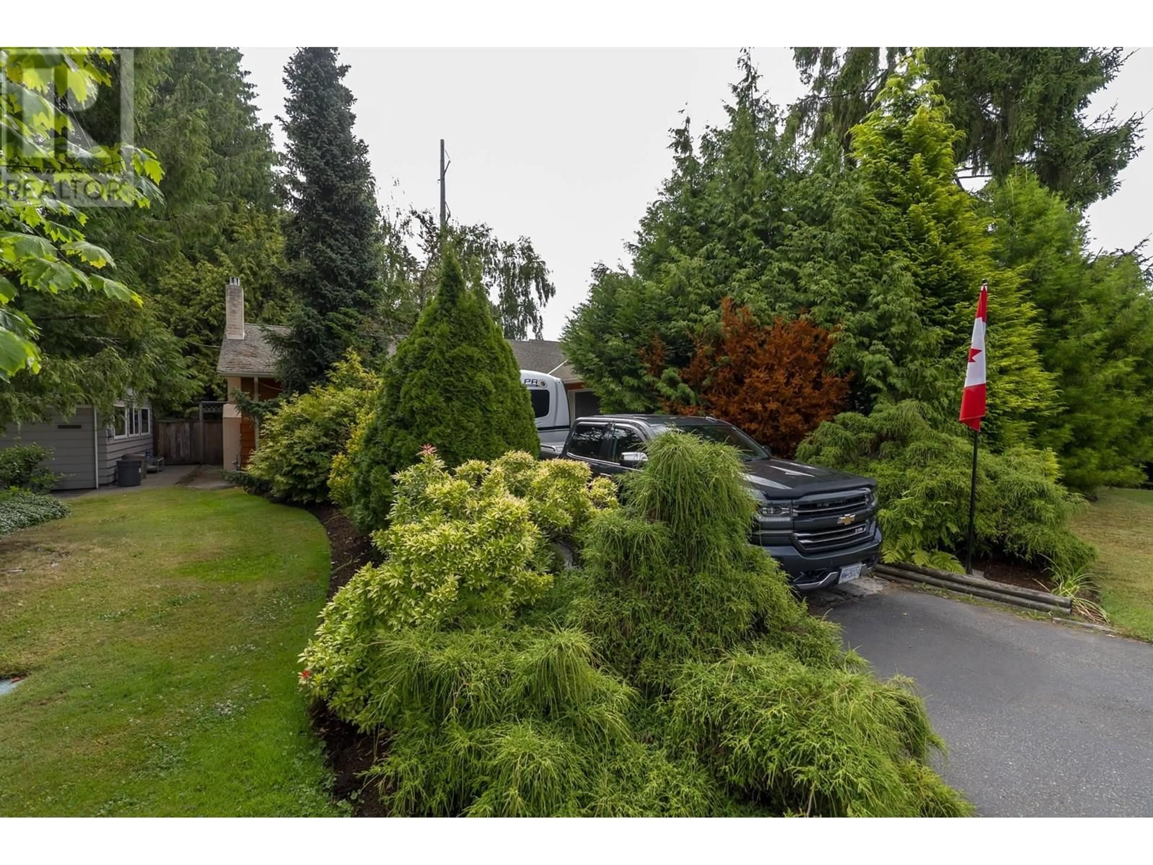 A pic from outside/outdoor area/front of a property/back of a property/a pic from drone, street for 1414 53A STREET, Delta British Columbia V4M3E6