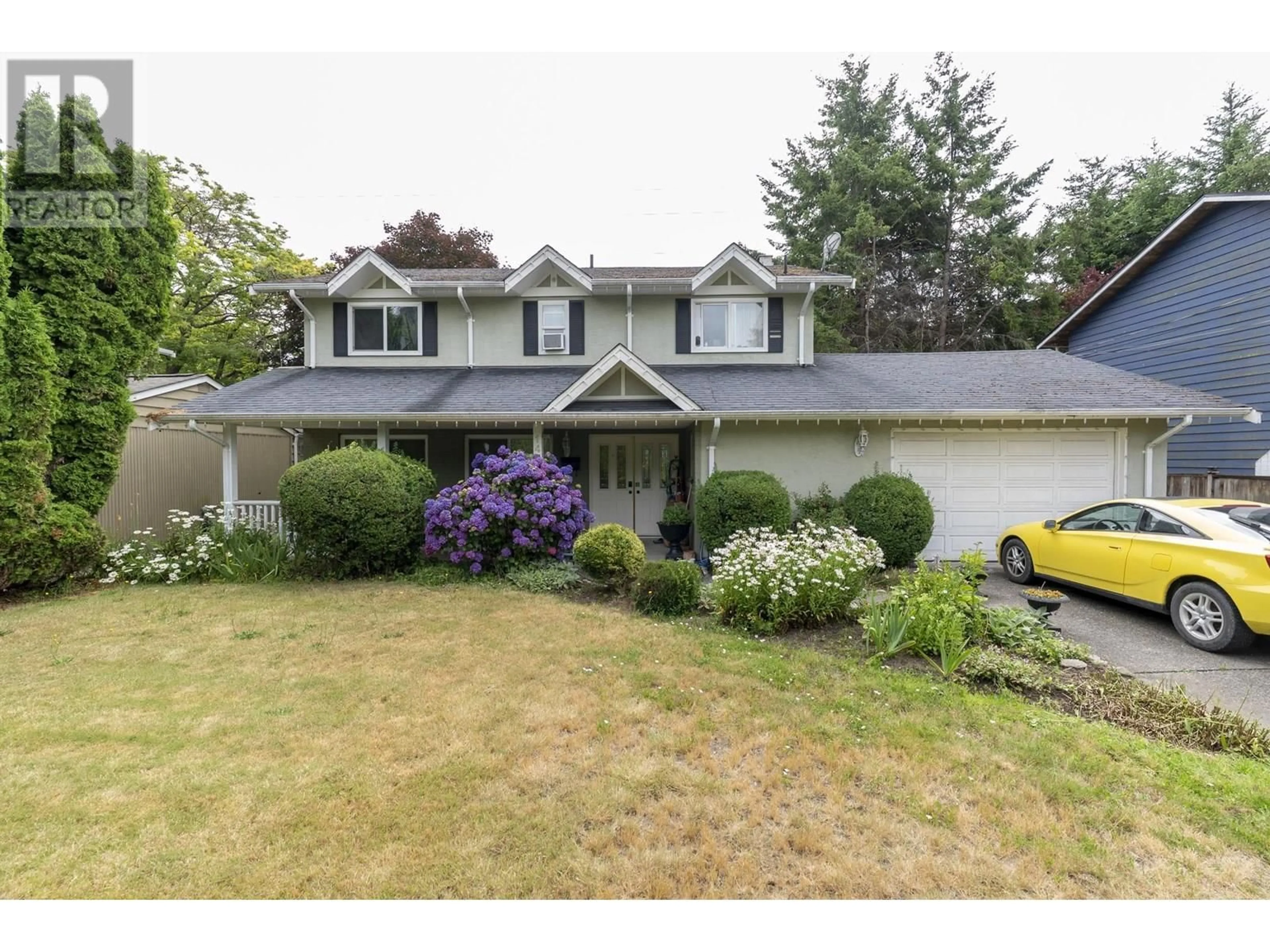 Home with vinyl exterior material, street for 1438 53A STREET, Delta British Columbia V4M3E6