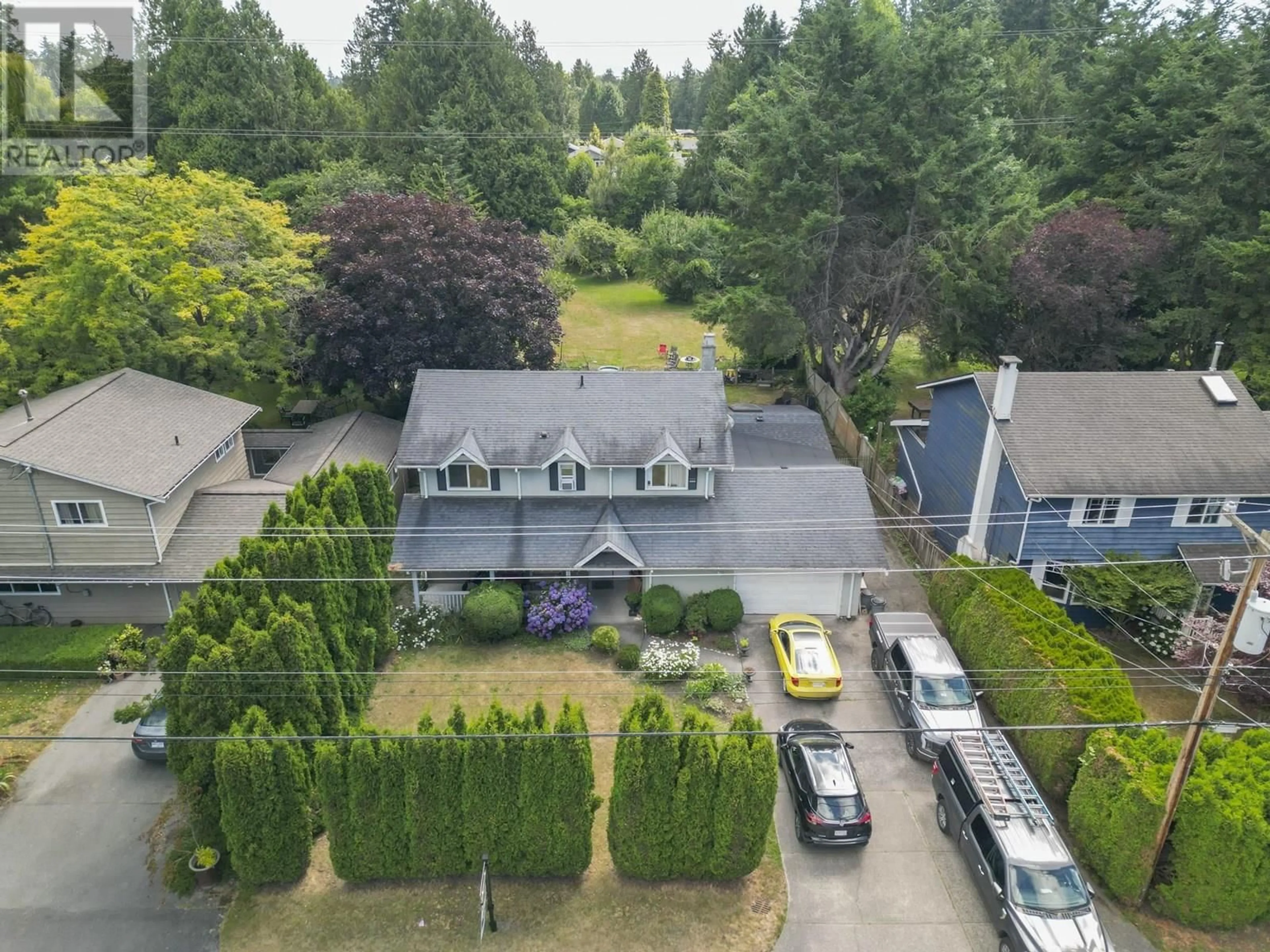 A pic from outside/outdoor area/front of a property/back of a property/a pic from drone, street for 1438 53A STREET, Delta British Columbia V4M3E6