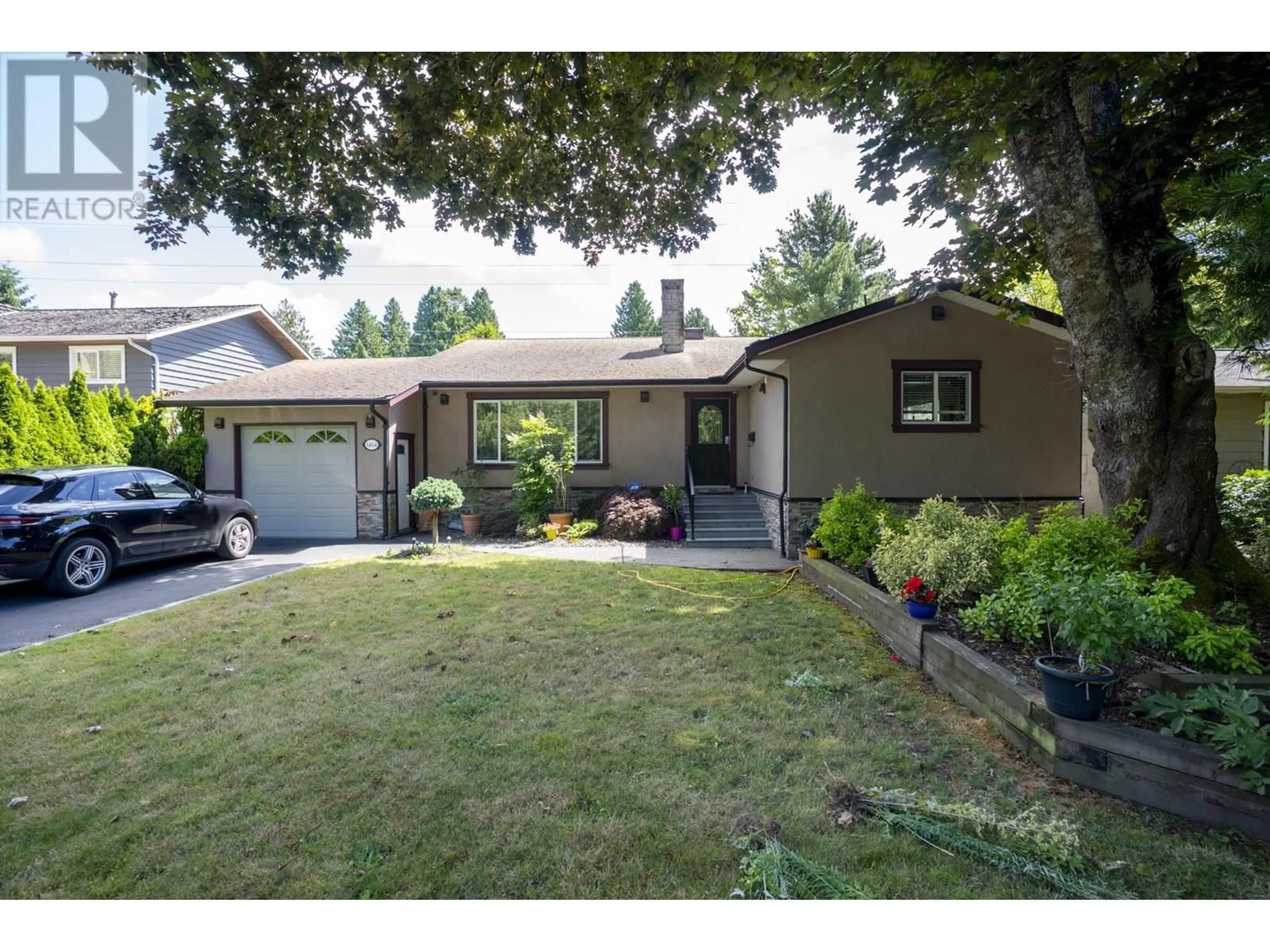 Home with vinyl exterior material, street for 1464 53A STREET, Delta British Columbia V4M3E6