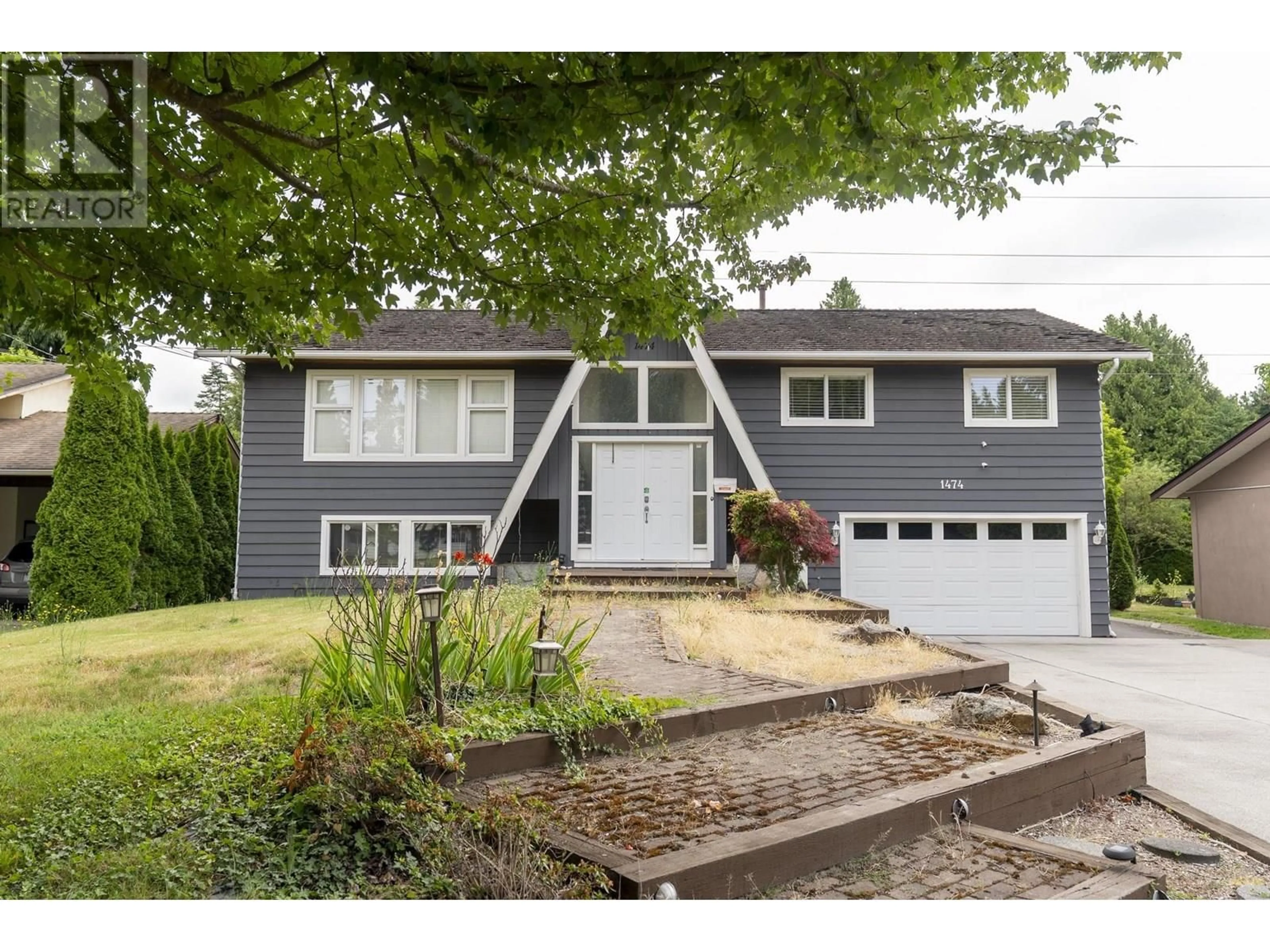 Home with vinyl exterior material, street for 1474 53A STREET, Delta British Columbia V4M3E6